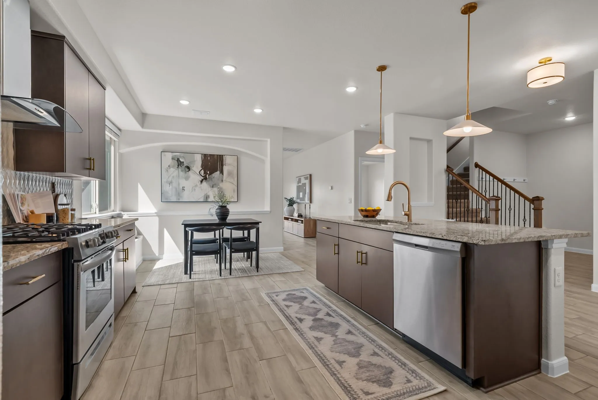 Eat-in kitchen with large island and pendant lighting