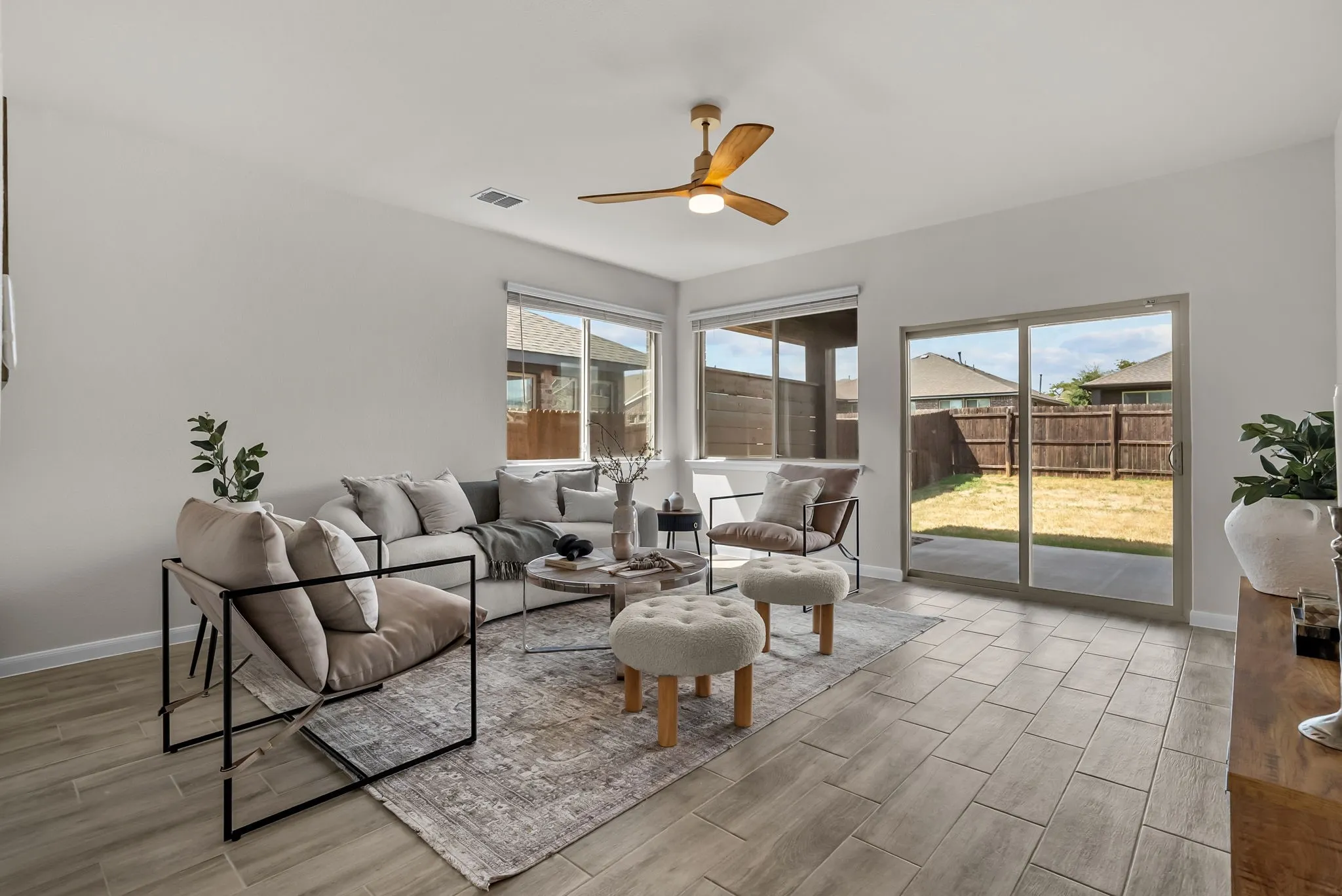 Sliding glass doors leading to covered back porch