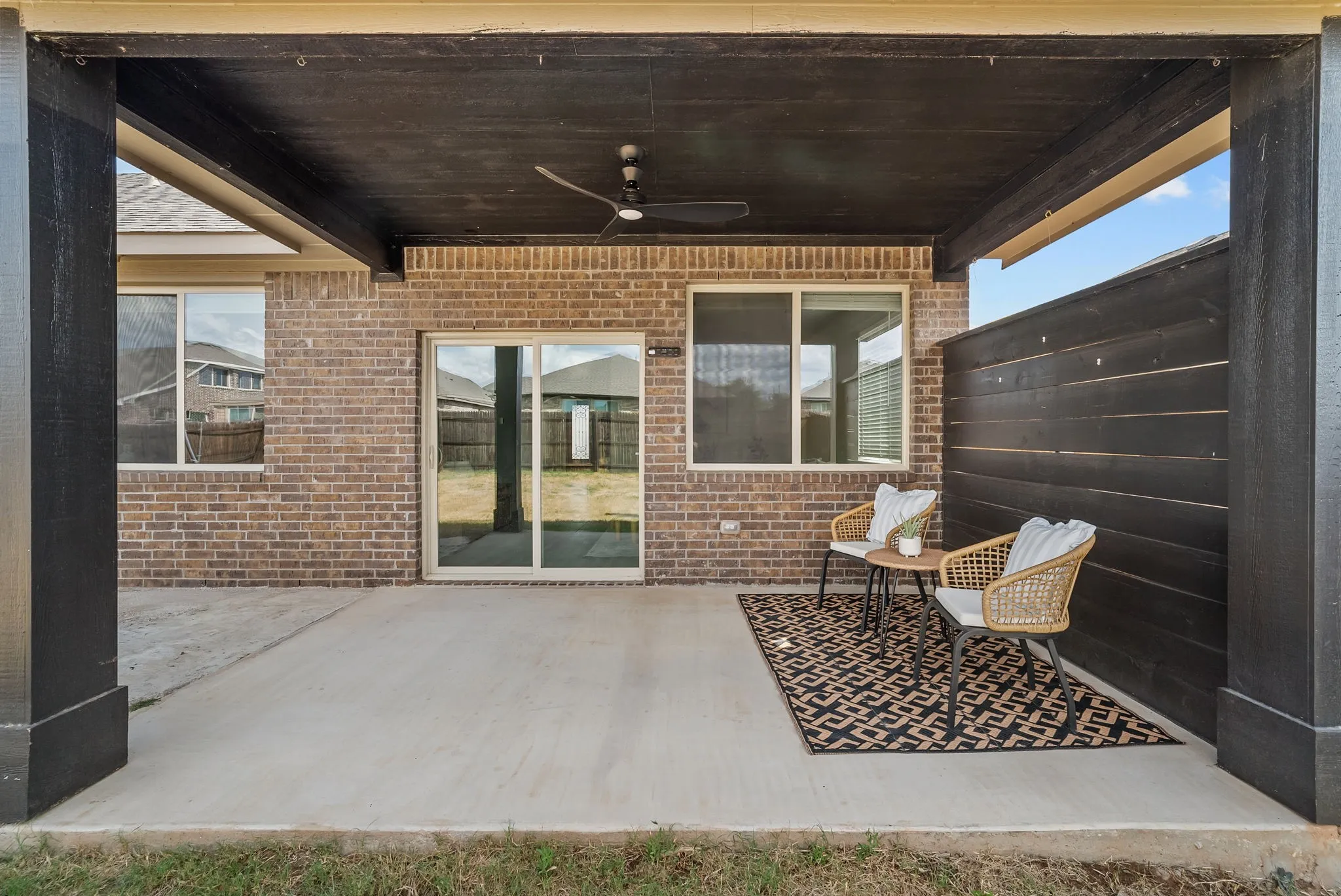 Covered patio with privacy wall