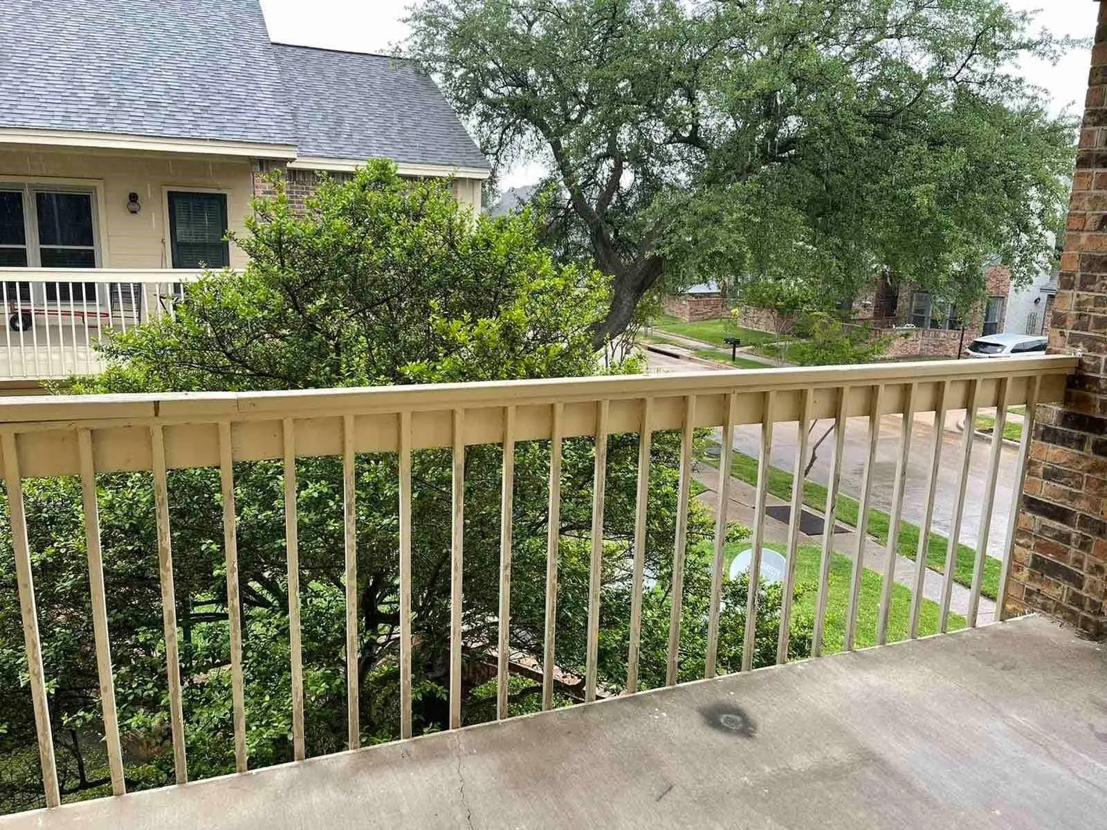 Concrete balcony with a metal railing