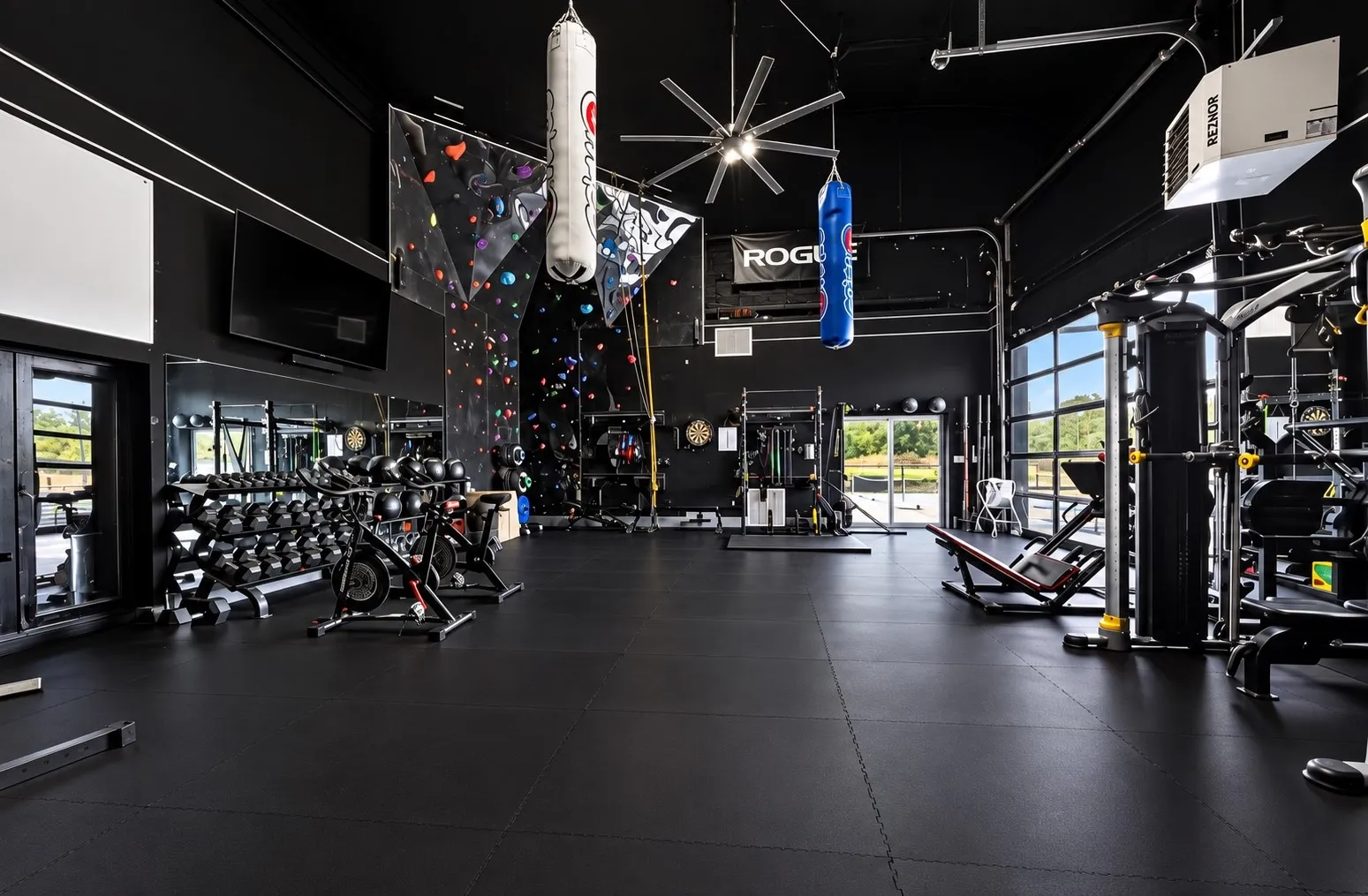 Incredible indoor gym space with rock climbing wall
