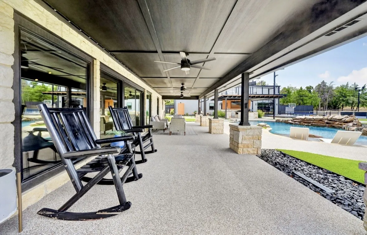 Back patio with floor to ceiling windows