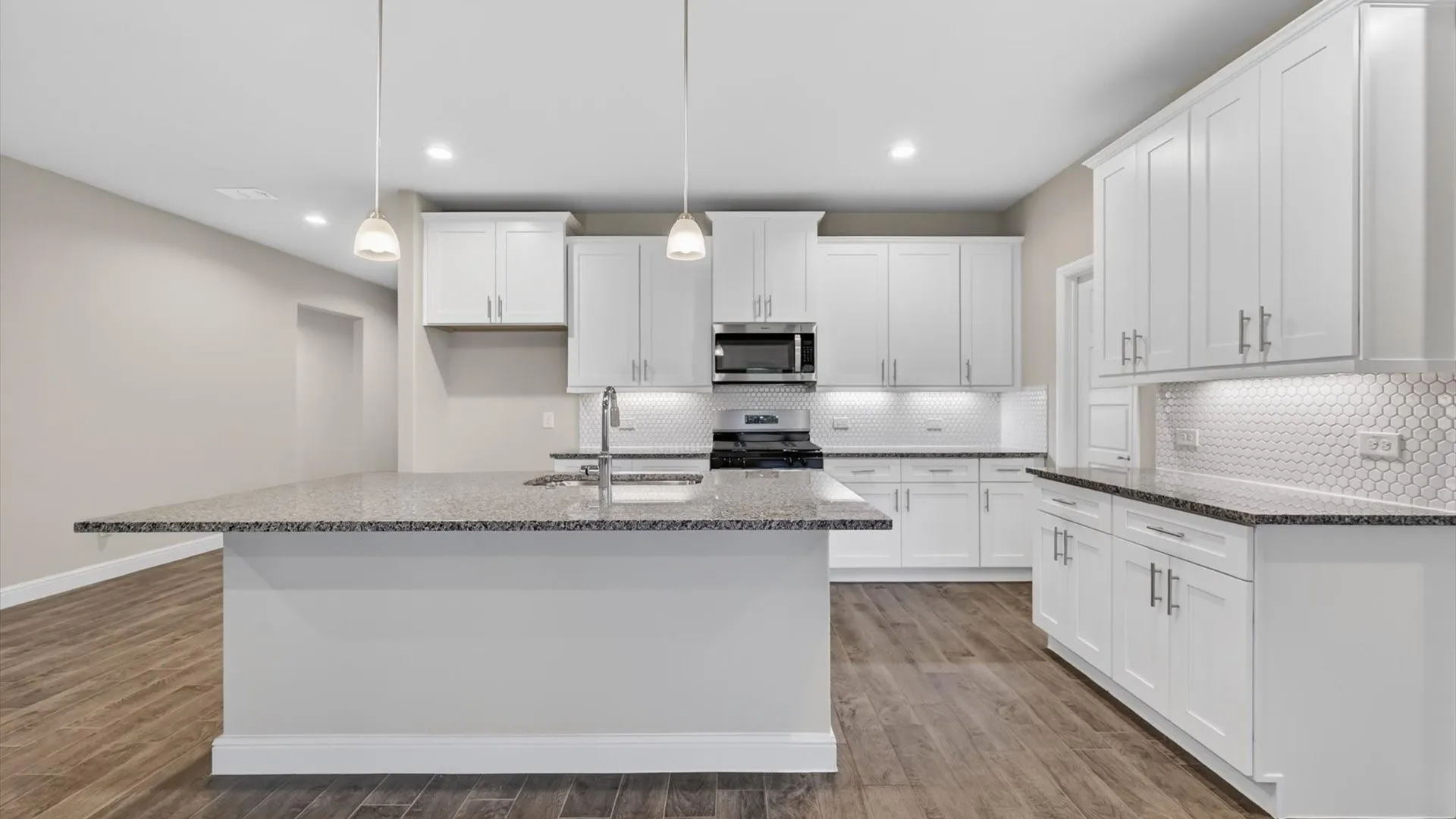 Kitchen - All Home and community information, including pricing, included features, terms, availability and amenities, are subject to change at any time without notice or obligation. All Drawings, pictures, photographs, video, square footages, floor plans, elevations, features, colors and sizes are approximate for illustration purposes only and will vary from the homes as built.
