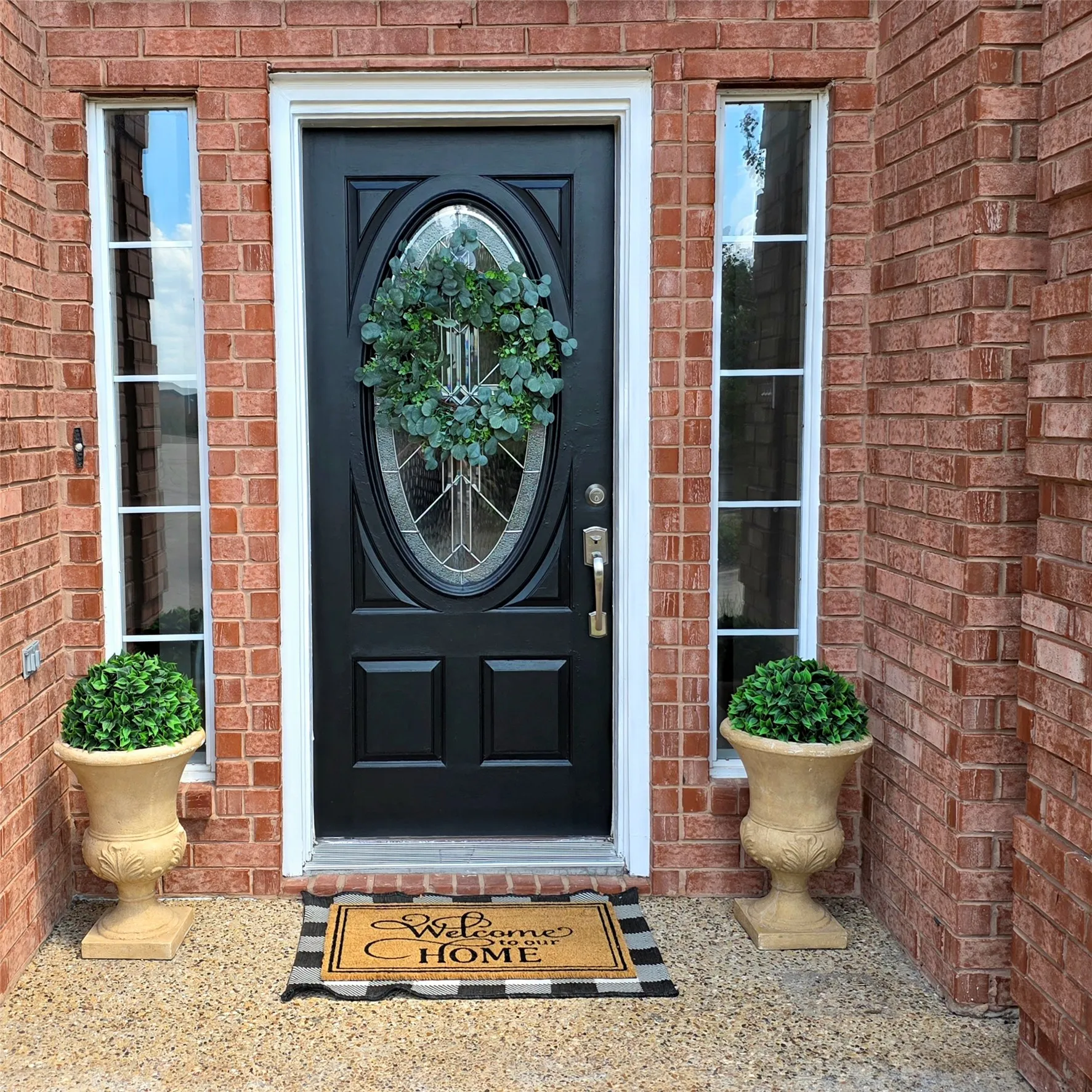 Welcome to 316 Harbor Landing...check out her oval leaded glass insert in the wooden front door !