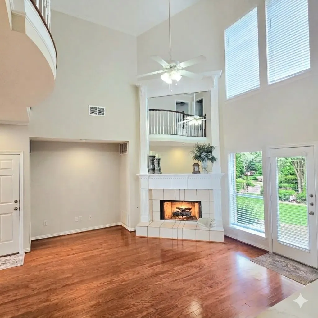 Here we have Soaring two story ceilings with an upper-level serpentine balcony, cozy raised hearth fireplace with faux woodlogs, newly refinished rich wood flooring with  serene views of the greenbelt area surrounding one of several catch and release. stocked community ponds behind this beauty!