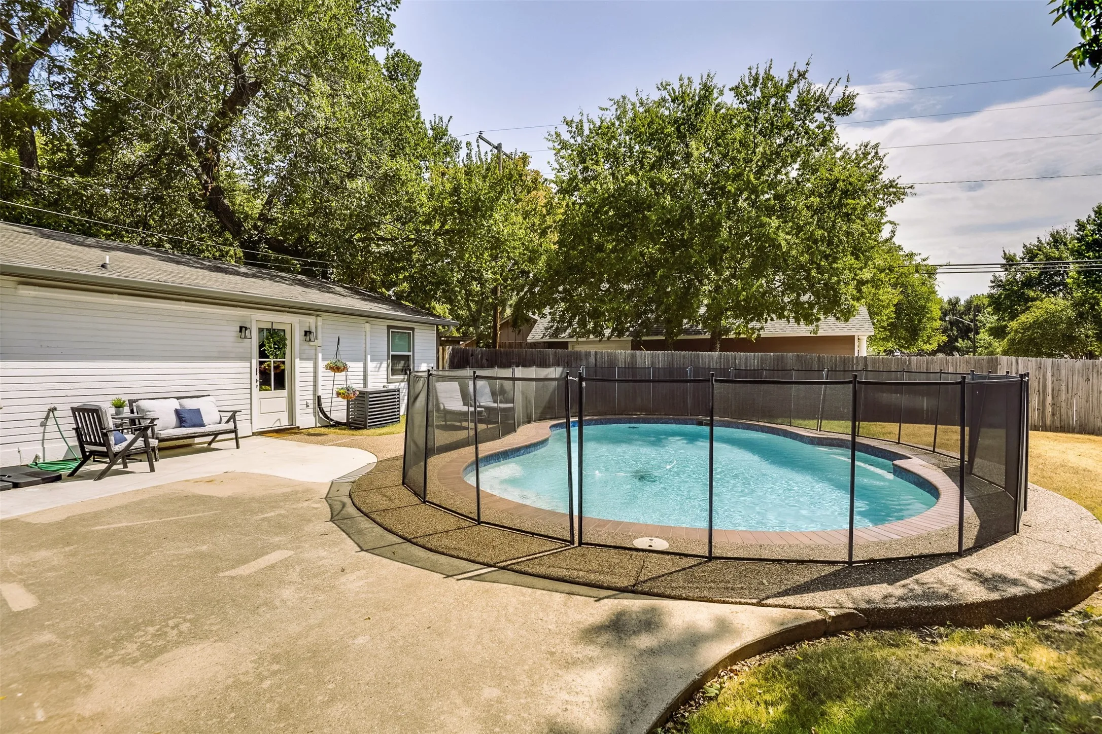 Crystal clear pool offers a cool, refreshing respite, while the generous yard provides plenty of room for the kids and family dog to run, play and enjoy the outdoors.  Perfect for making memories.