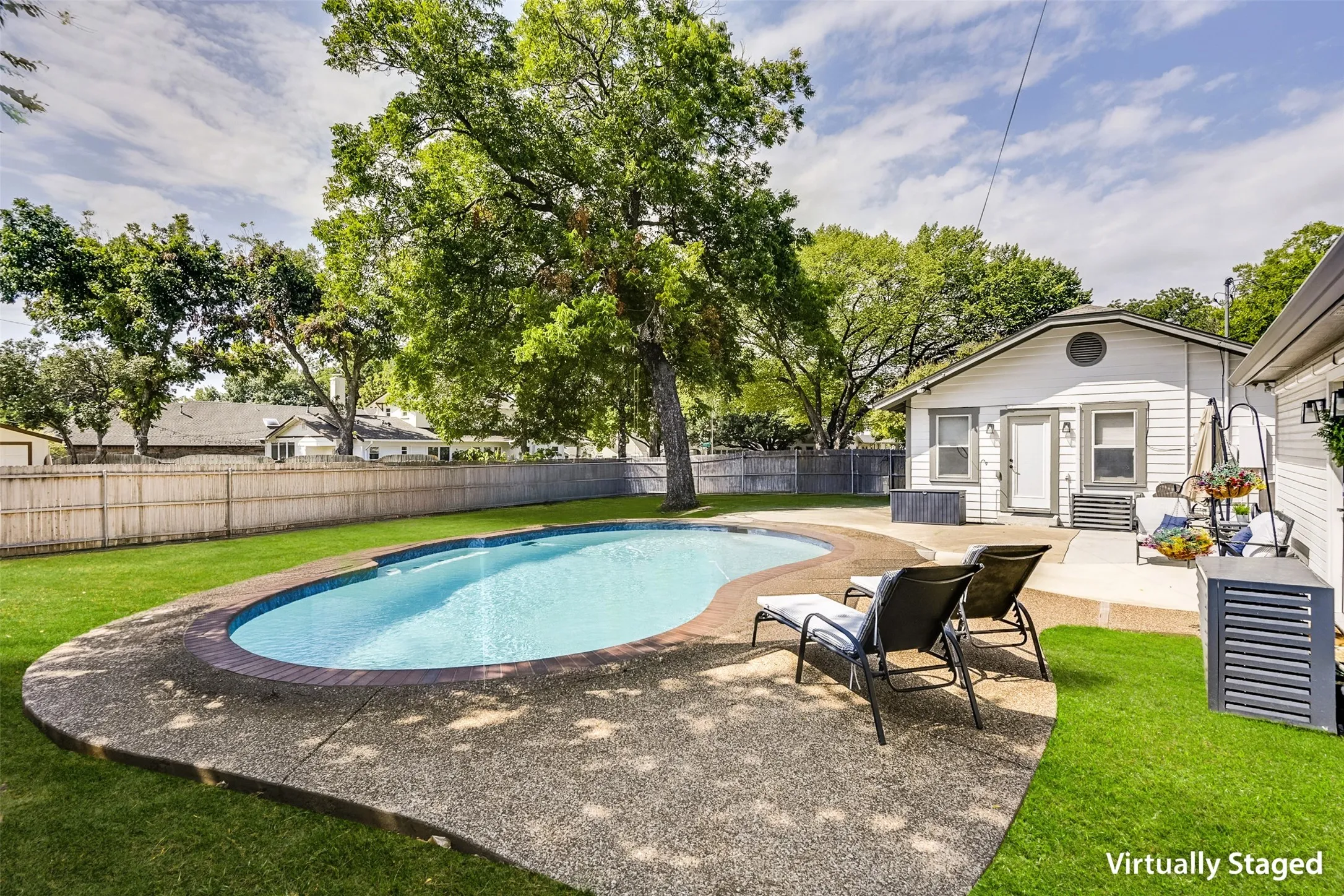 Especially impressive are the outdoor living spaces with multiple patios perfectly suited for entertaining and enjoying al fresco evenings.  The resort styled pool provides the perfect centerpiece for relaxing at the end of the day.