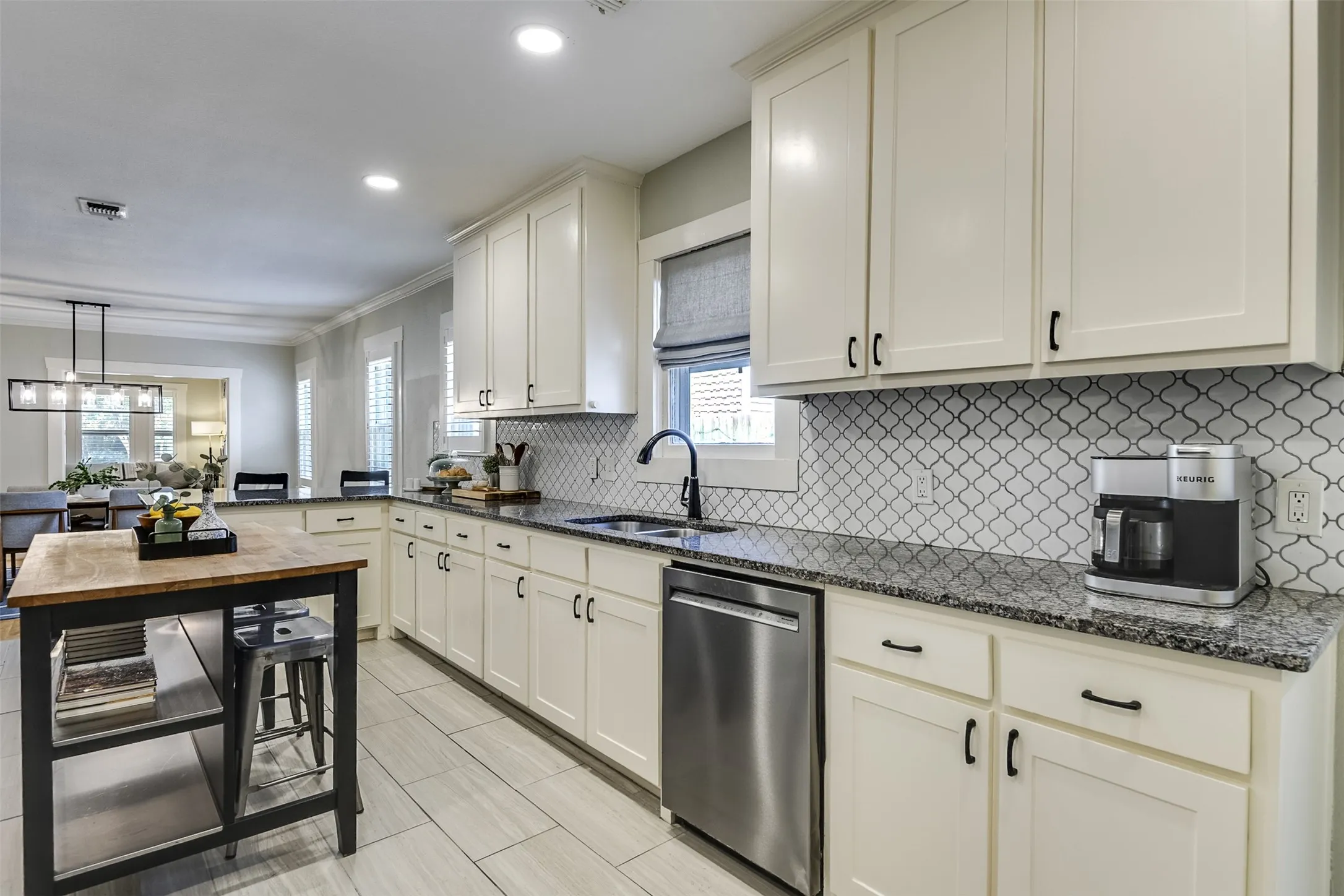 At the heart of the home, this grand-scale kitchen opens seamlessly to the gathering spaces, keeping family and friends connected while meals are prepared.  Miles of generous prep space and an abundance of cabinetry create a dream setting for the family chef and an extraordinary backdrop for entertaining.