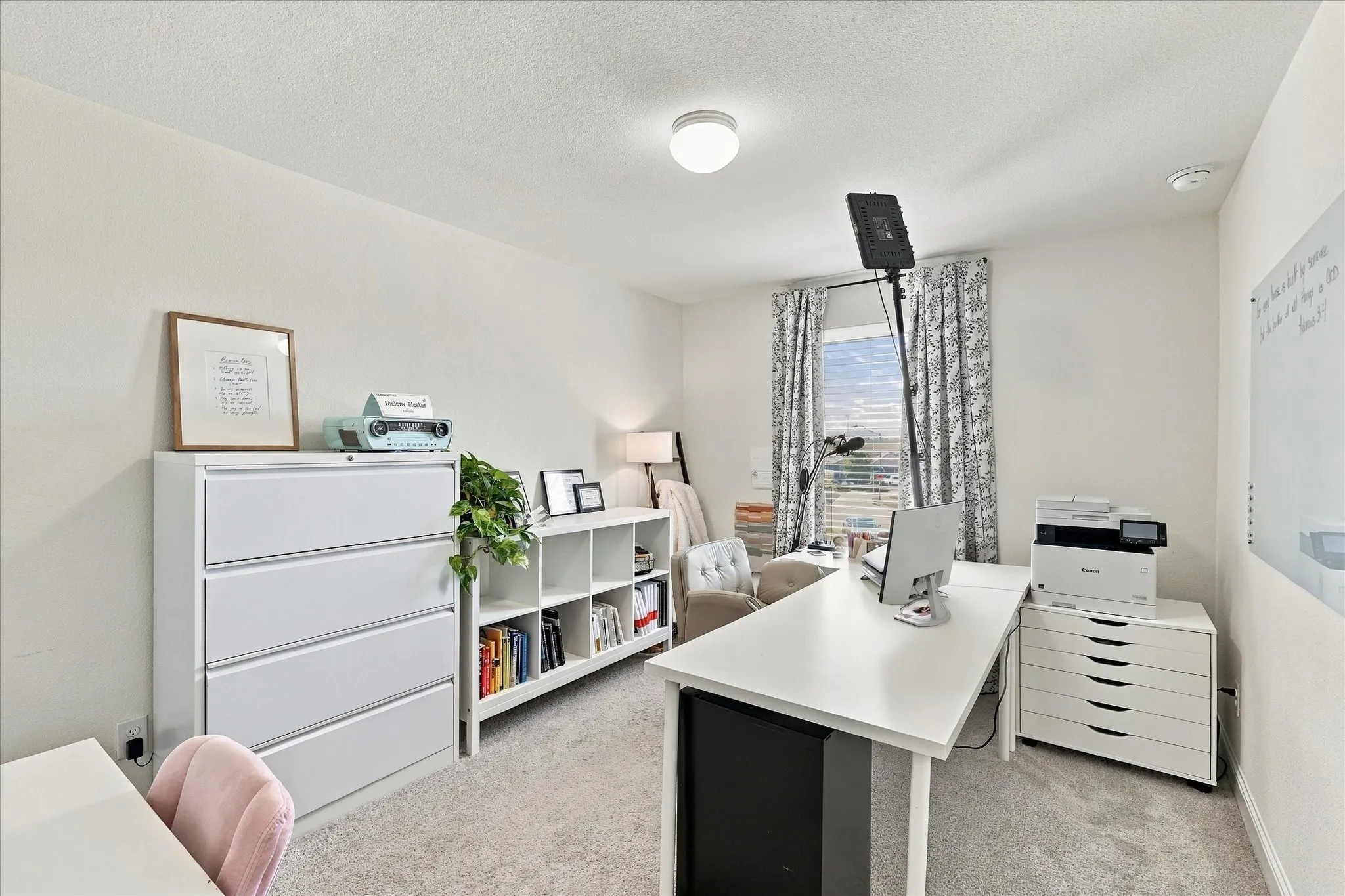 Bedrrom with large walk in closet currently being used as an office
