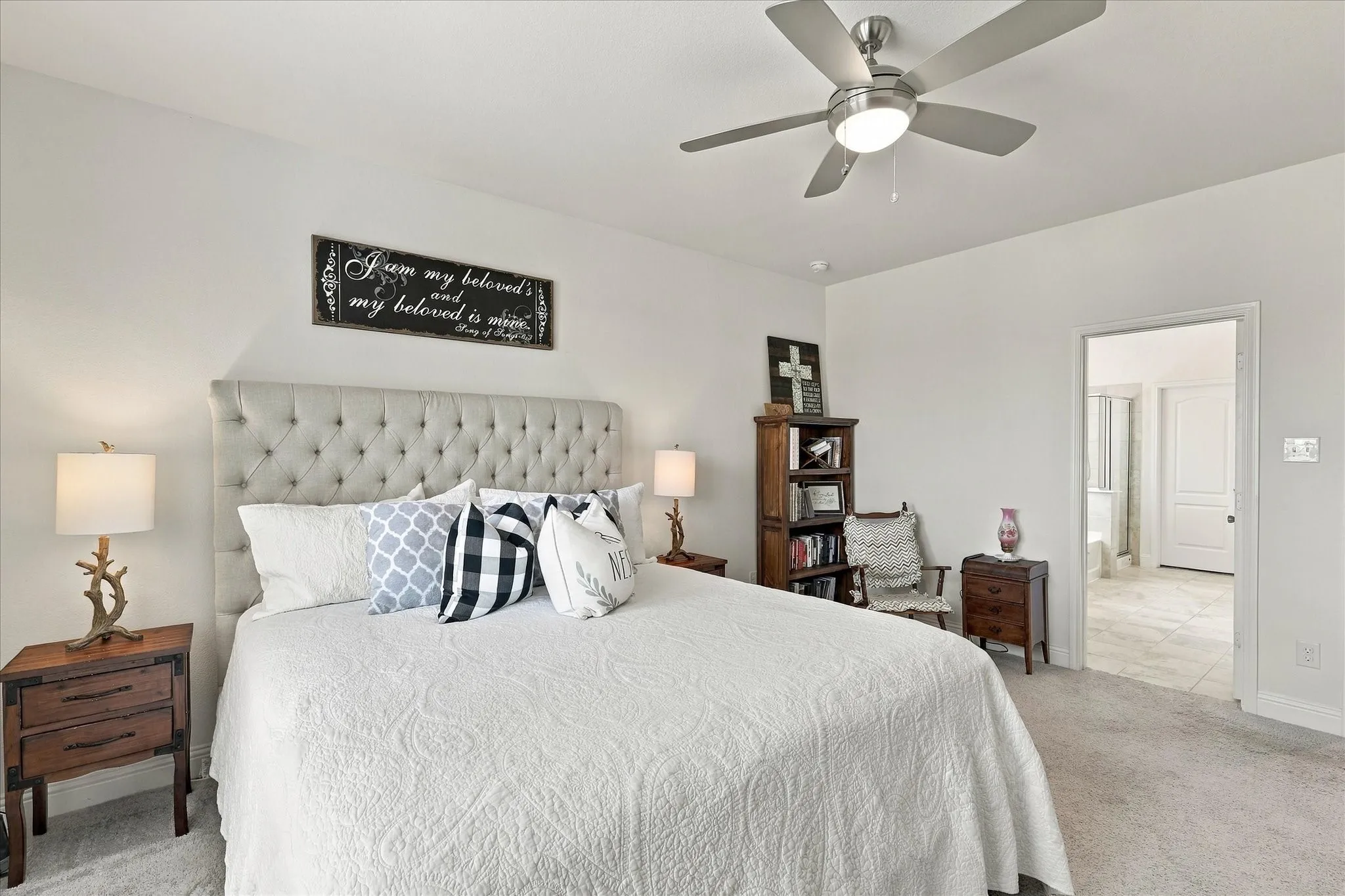 Oversized primary bedroom with California King bed and still room for an additional sitting area