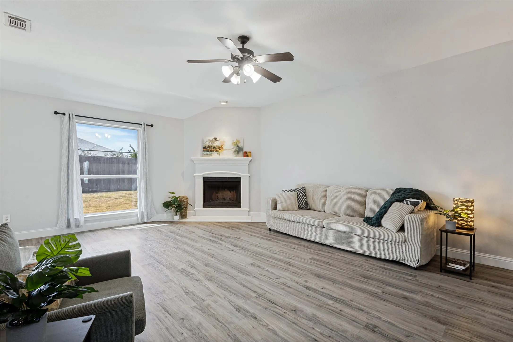 Open to Living room with beautiful wood burning fireplace