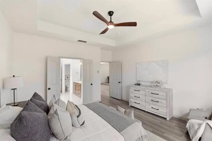 Owner suite located downstairs on rear of home