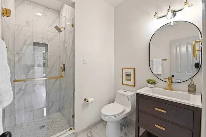 One of two full baths downstairs