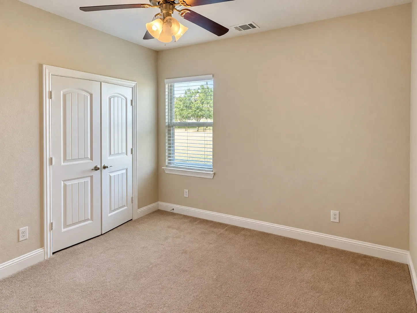 Neutral tone walls with white trim