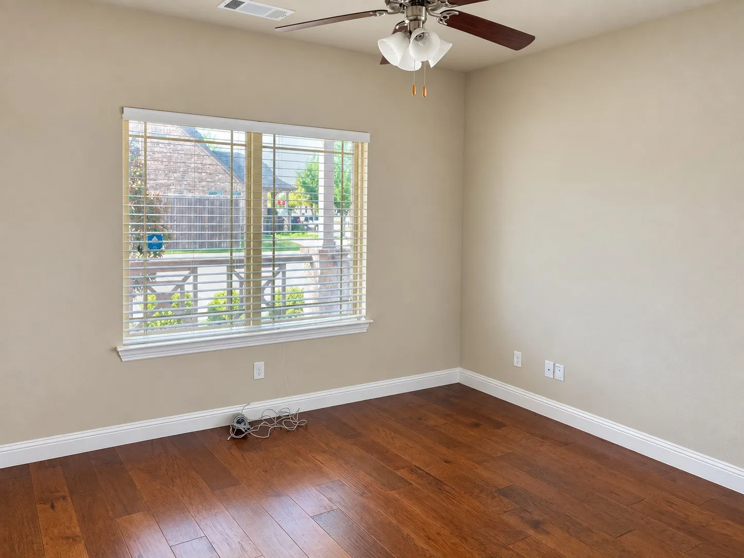 Hardwood flooring and light-toned walls