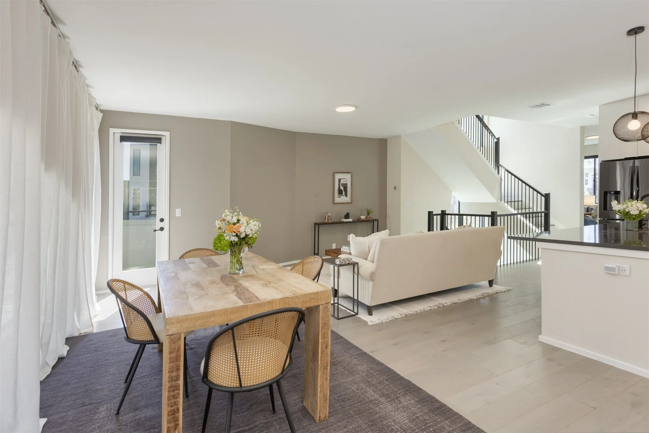 Dining room featuring light wood-style flooring and recessed lighting