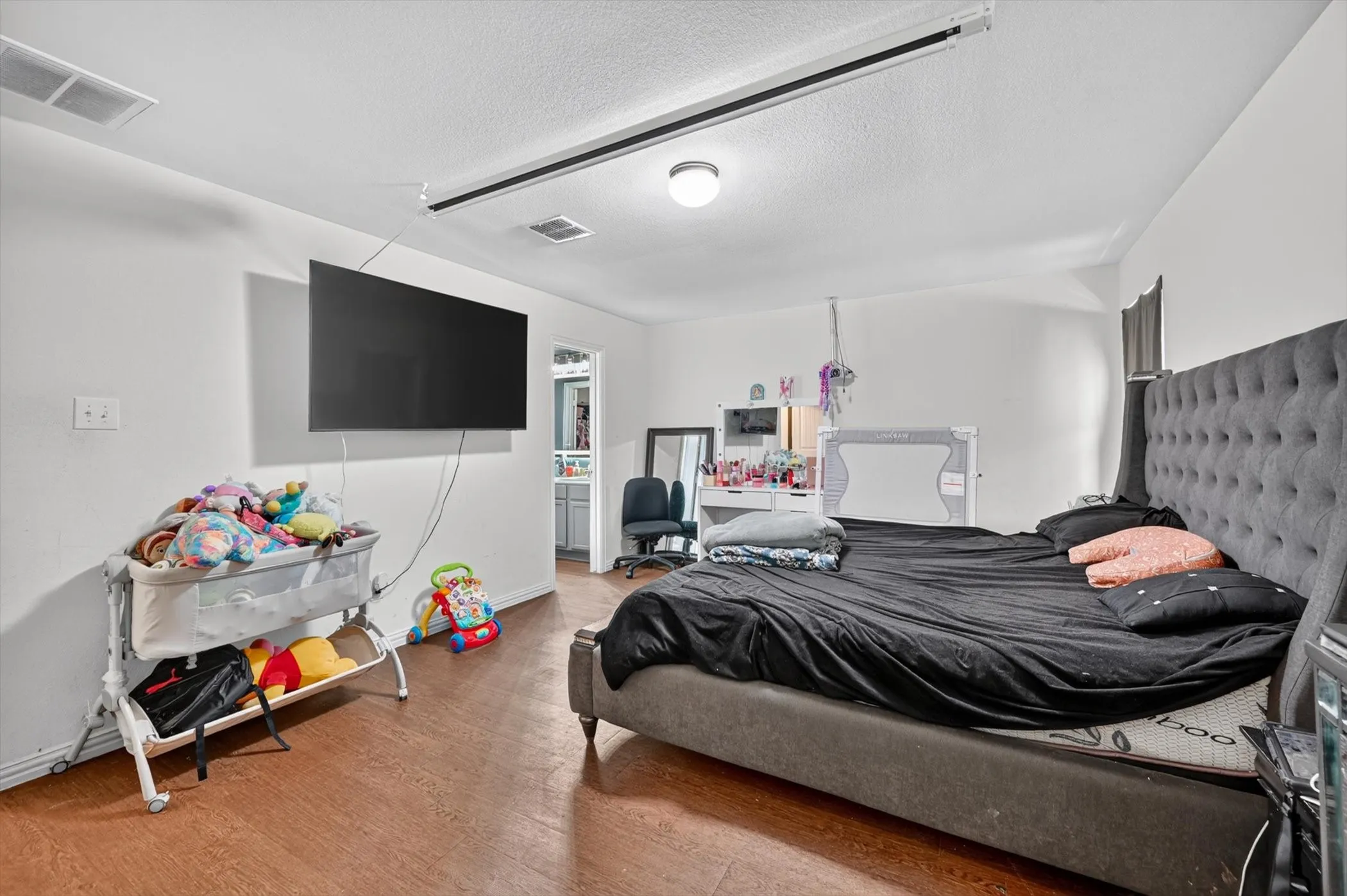 Wood-finish flooring with white walls