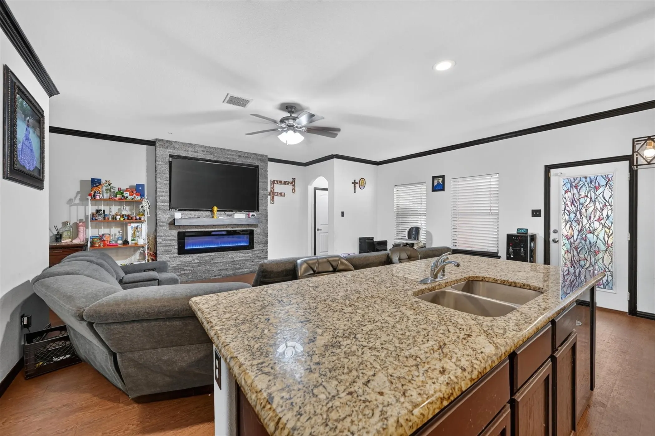 Stone accent wall with electric fireplace
