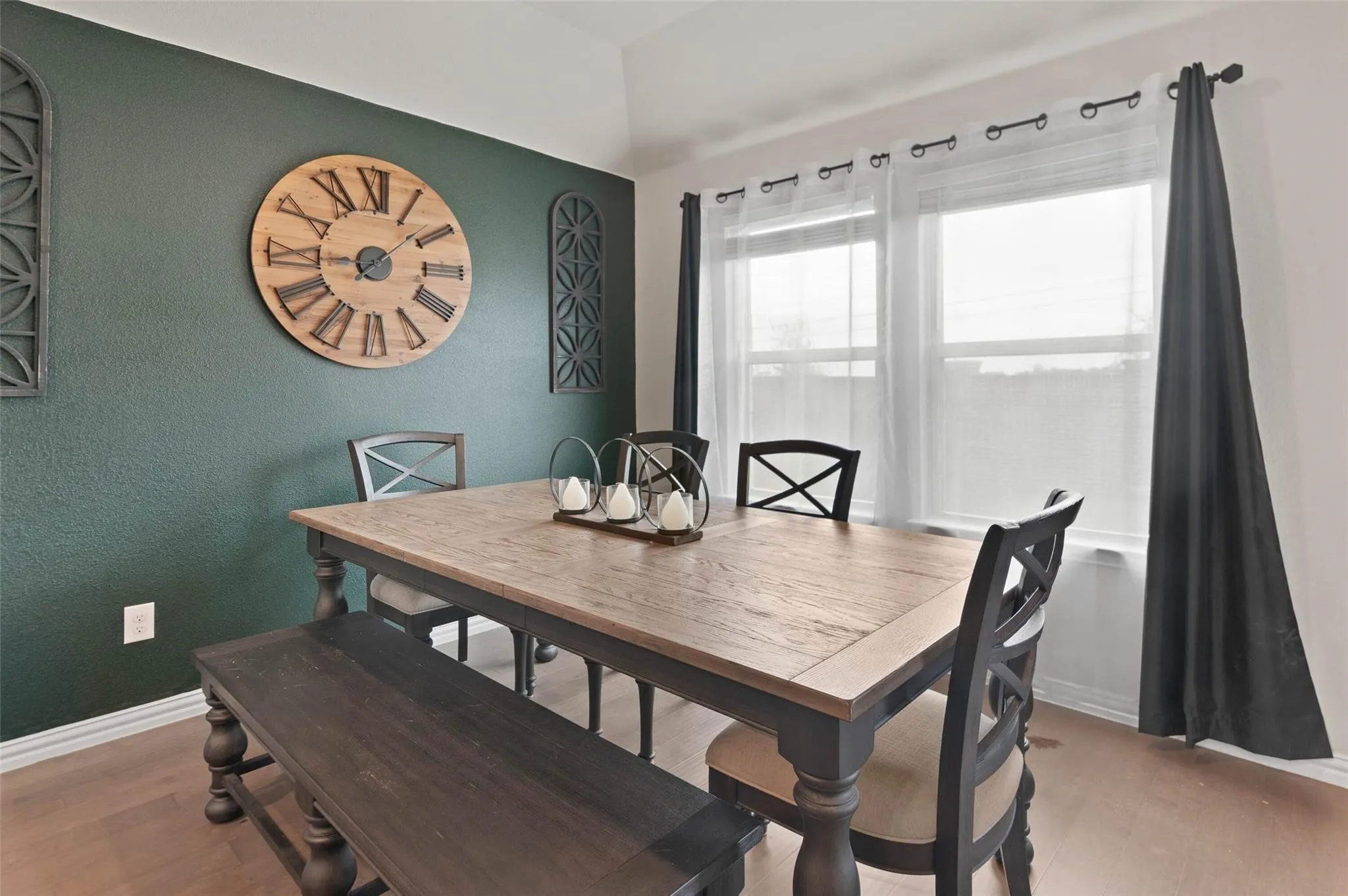 Textured accent wall and wood-finish flooring