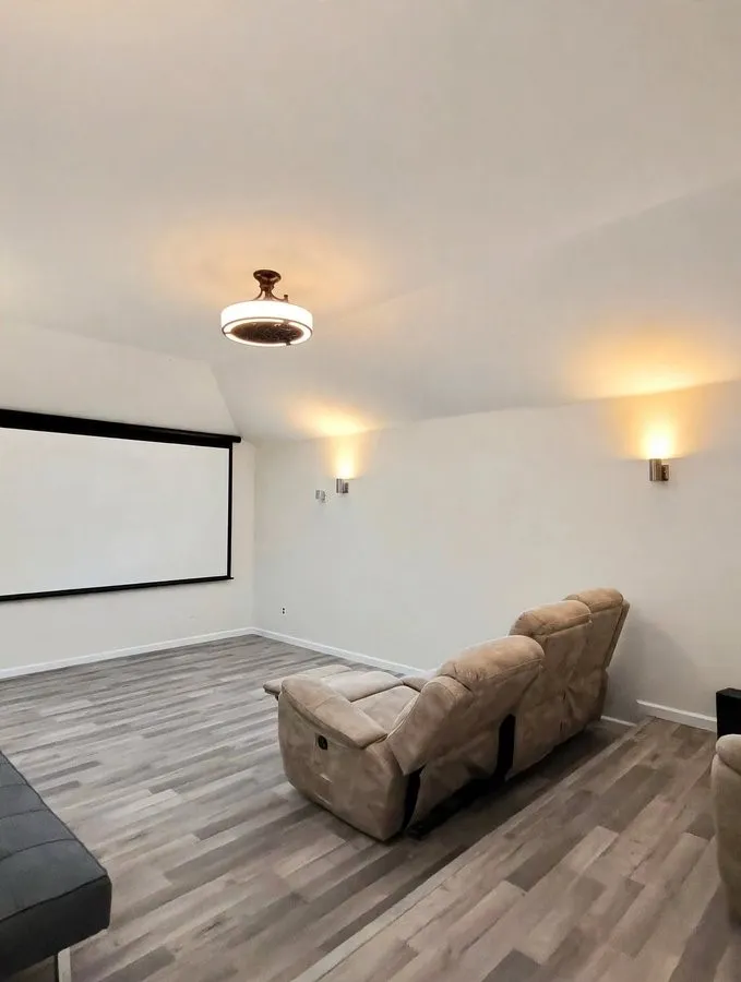 Integrated projector screen and wood-finish flooring