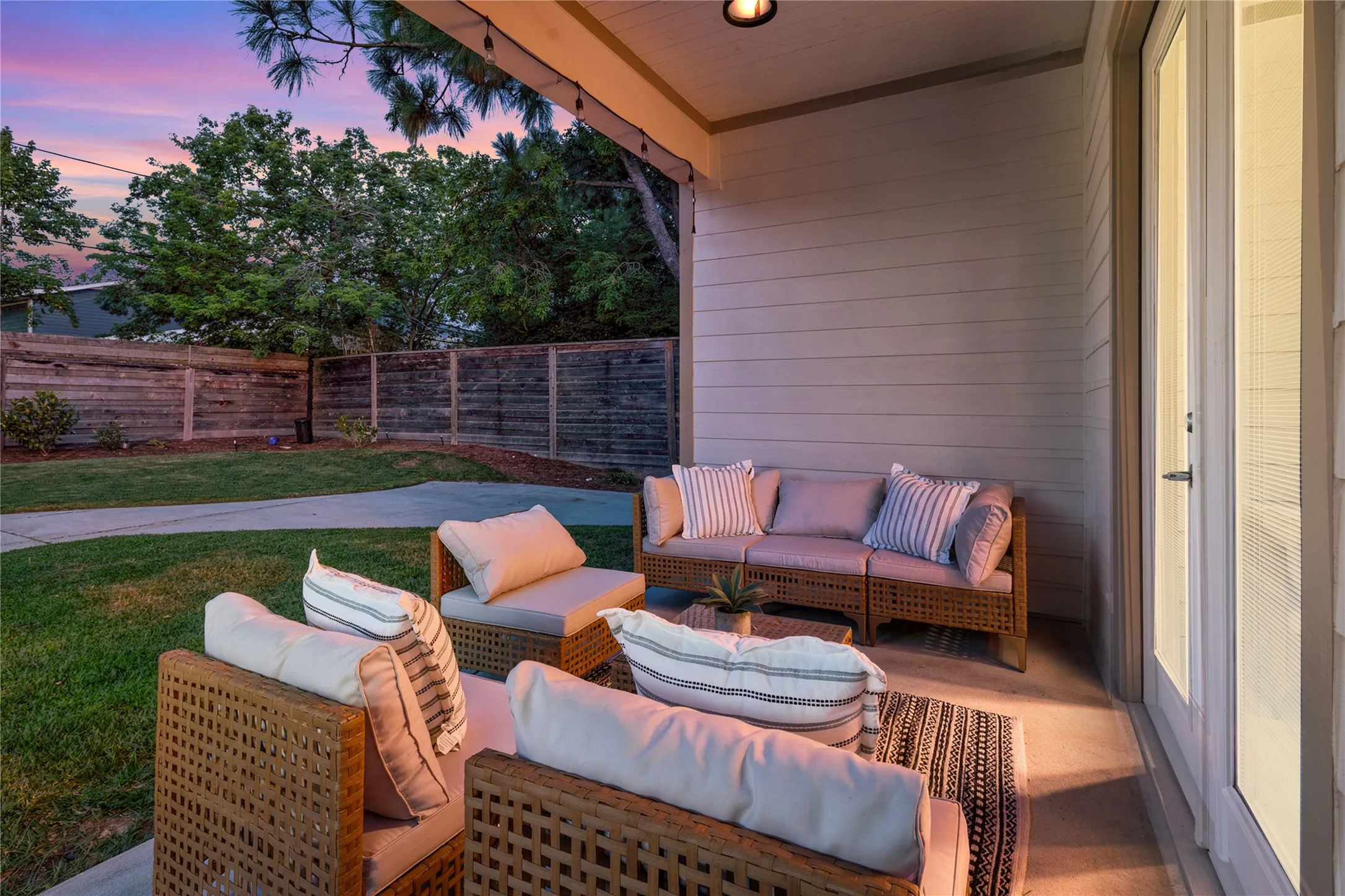 Covered patio with recessed lighting, concrete flooring, and direct access through double glass doors