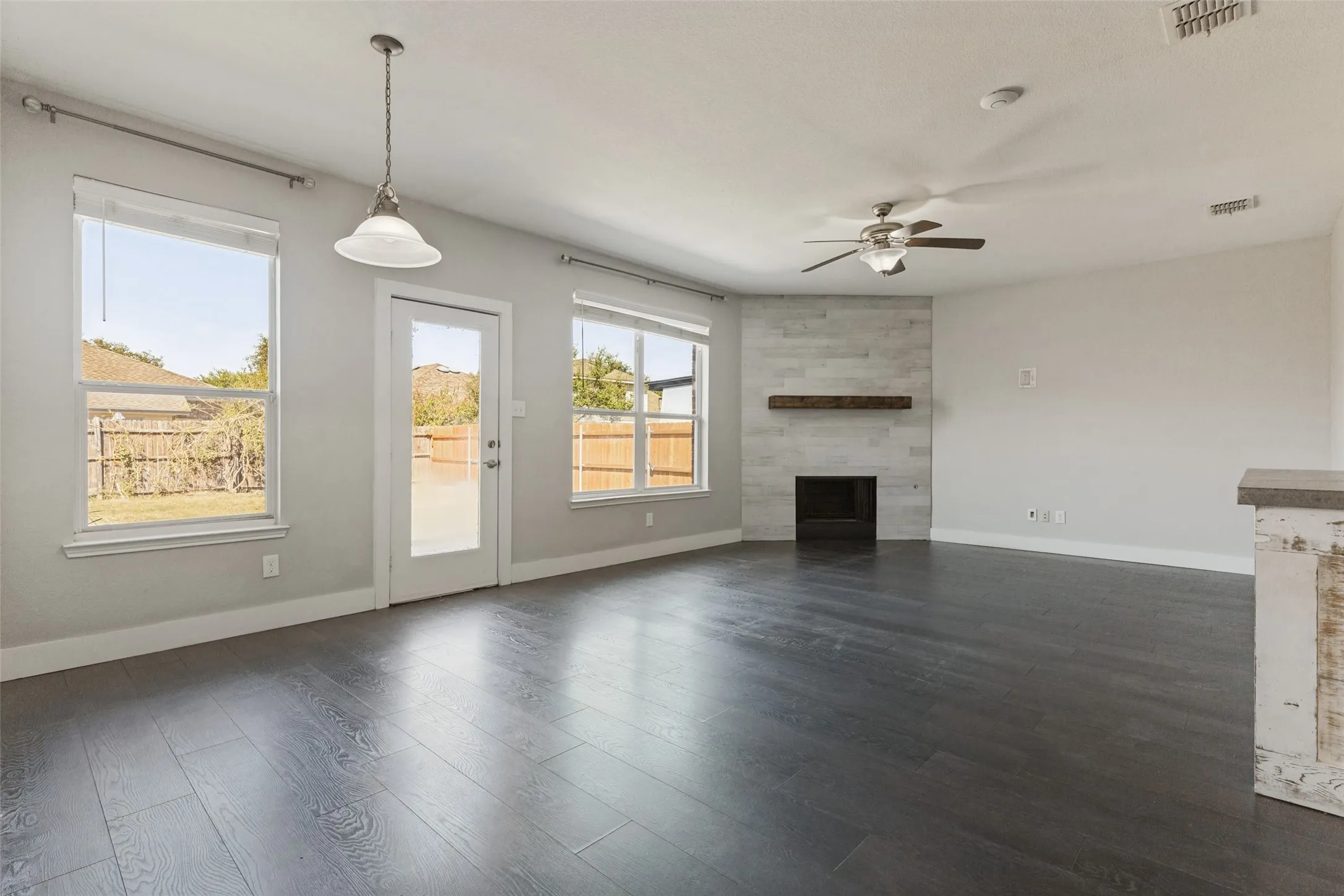 Living space with reclaimed wood mantle