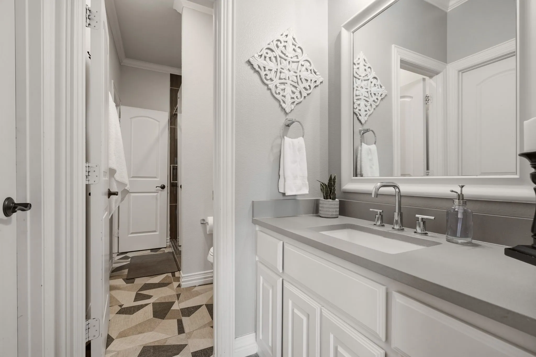 Completely renovated Jack and Jill bathroom that connects bedrooms 3 and 4 (each bedroom having it's own private vanity room)