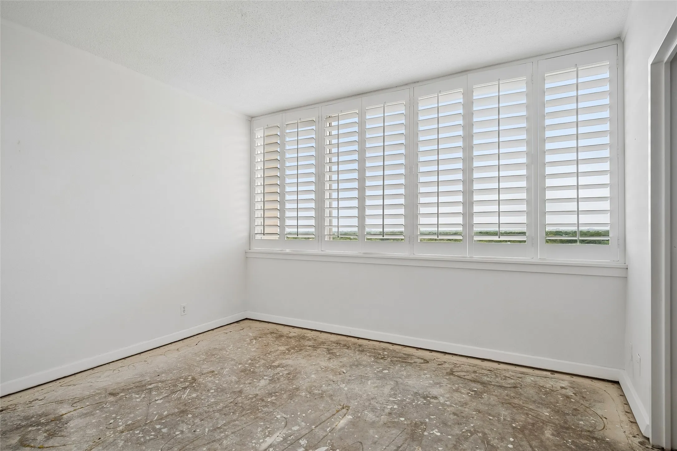 Custom shutters in primary suite