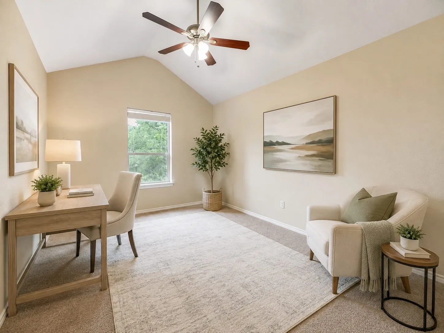 Vaulted ceiling, ceiling fan with integrated lighting, carpeted flooring, window with natural light, neutral wall colors