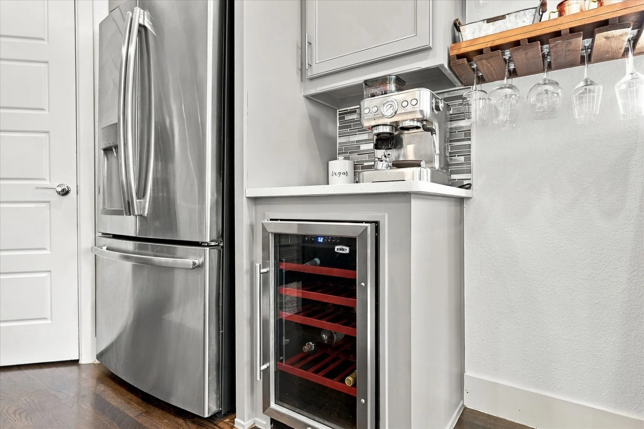 The upgraded wine fridge with accessory glass racks make entertaining a breeze!