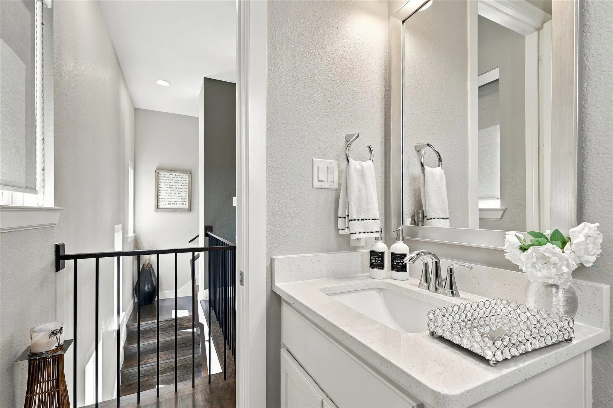Even the half bath is pretty and has a view of the trees out the other side!