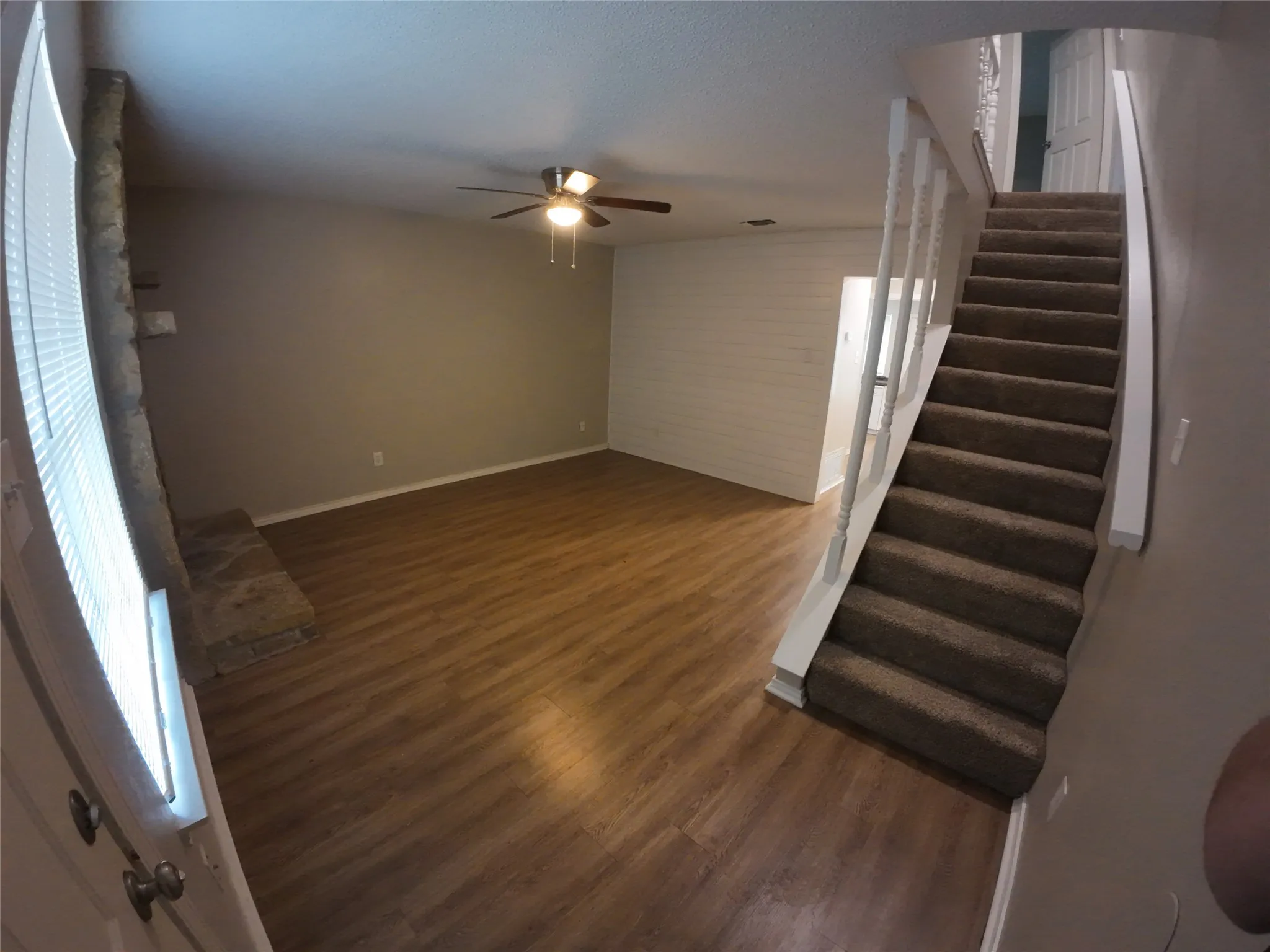 Wood-finish flooring throughout the main level