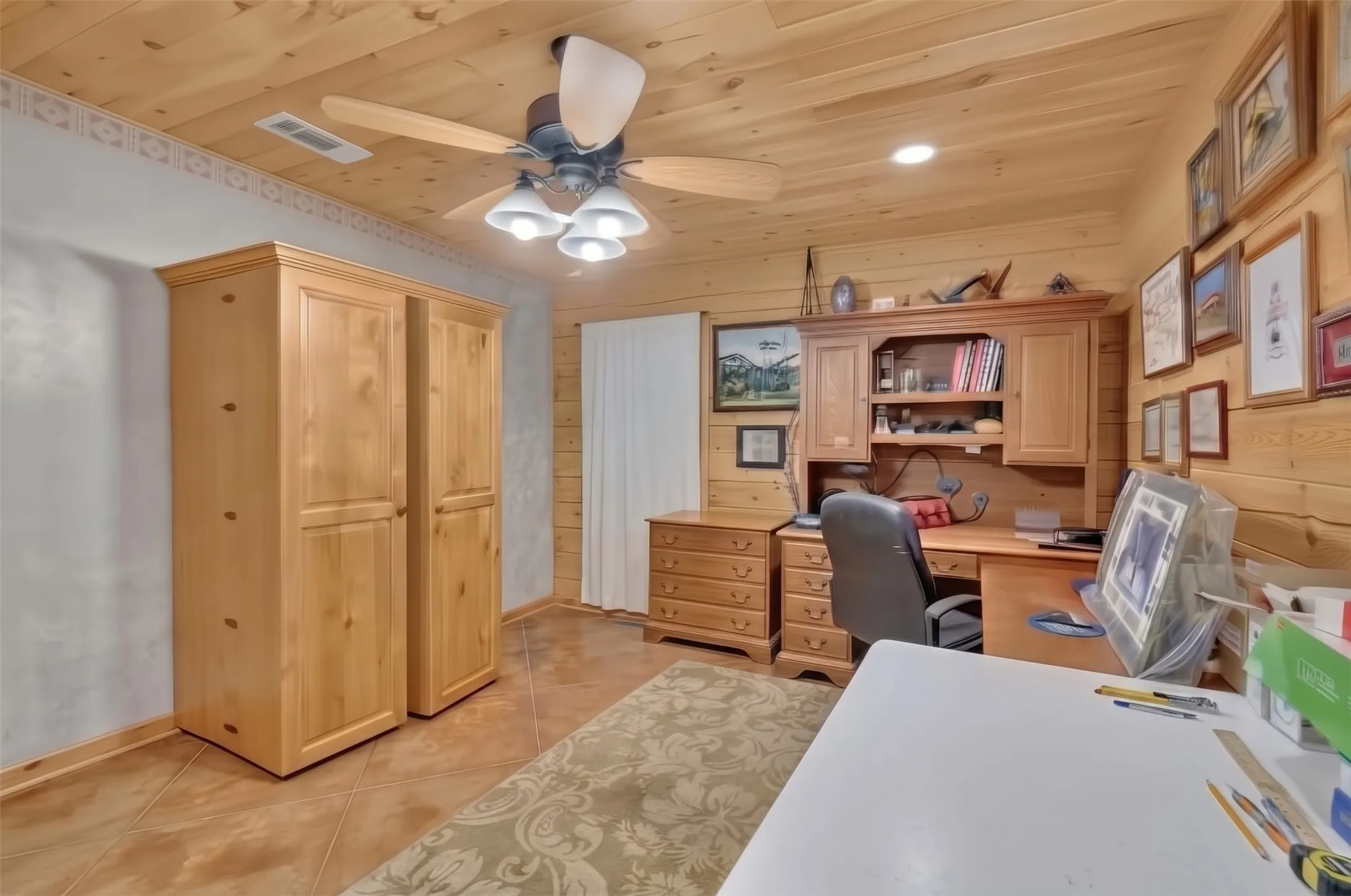 Wood-paneled walls and ceiling