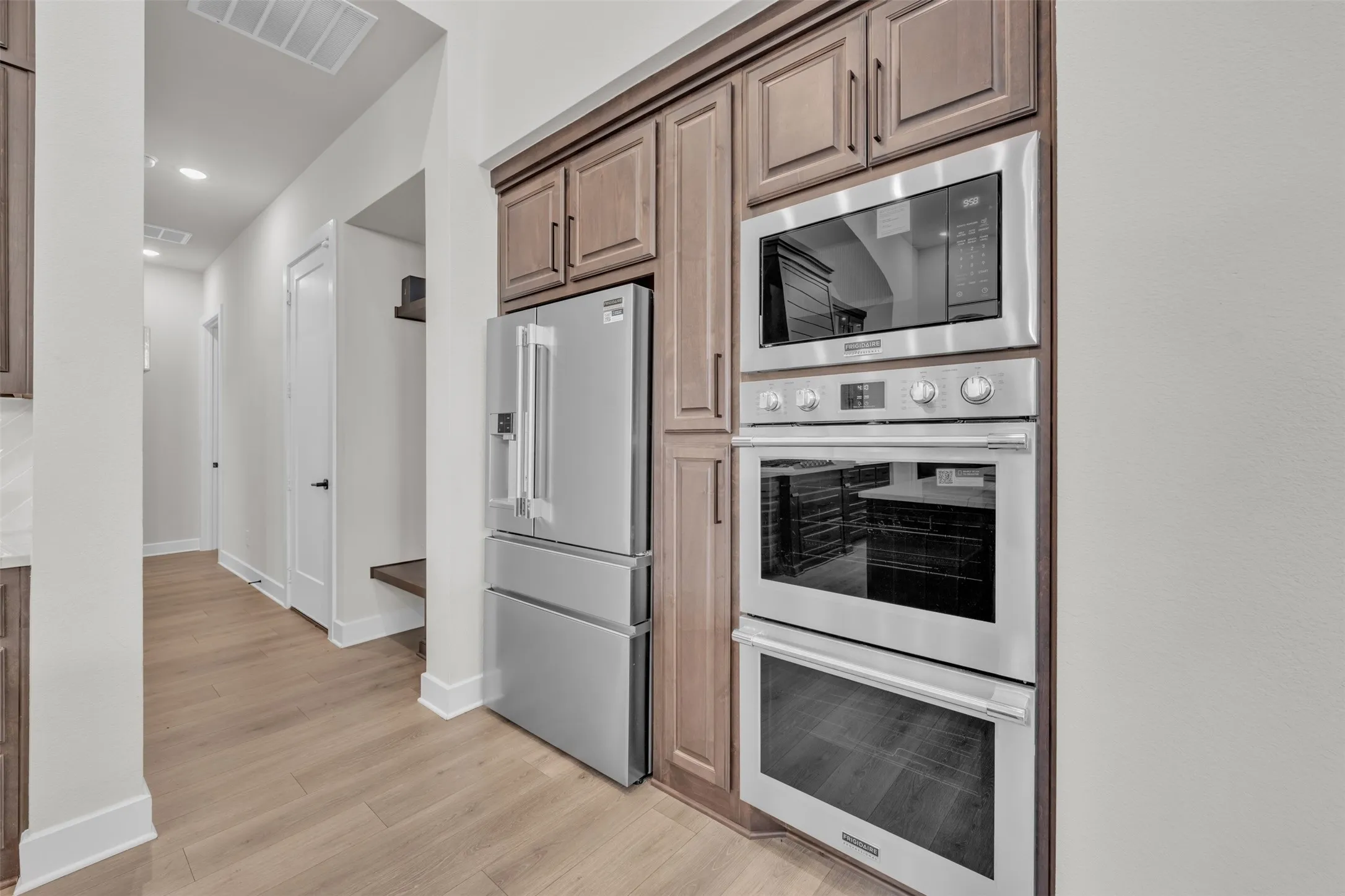 Mud Room in Hall. Double Oven in Kitchen.