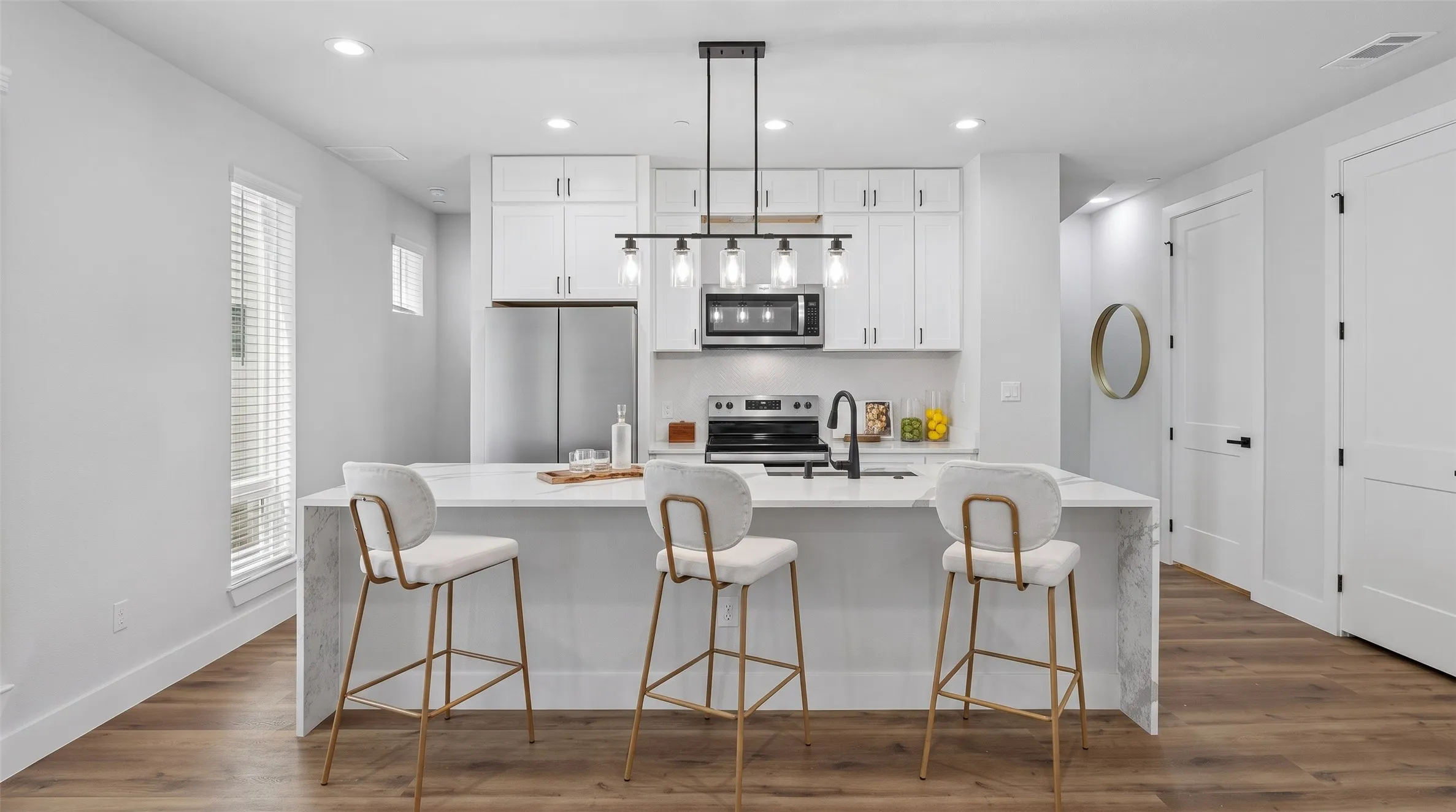 microwave and oven are virtually staged.  comparable stainless steel appliances will be installed prior to move in.