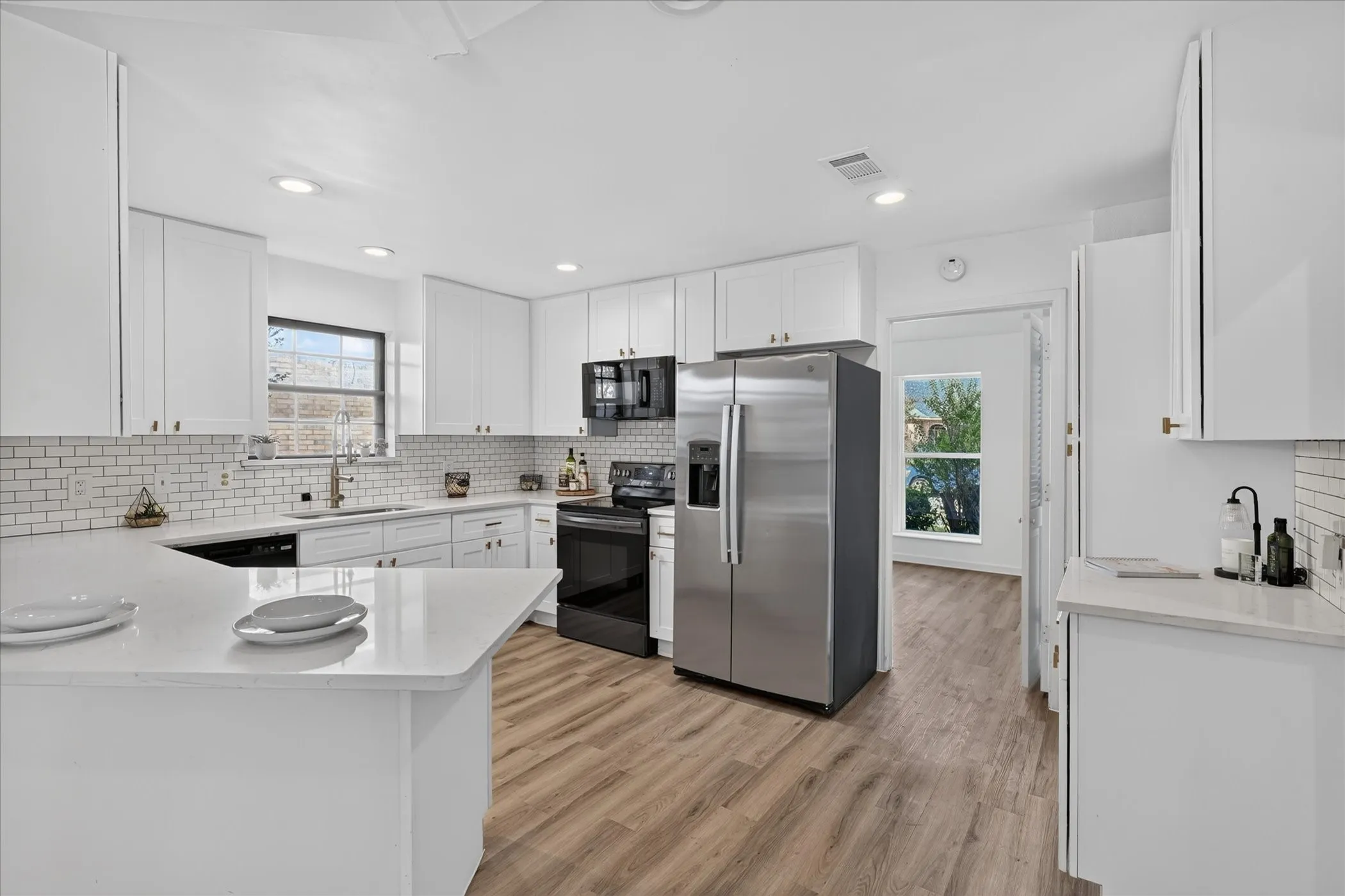 Another view of kitchen. Fridge will remain if buyer would like it.