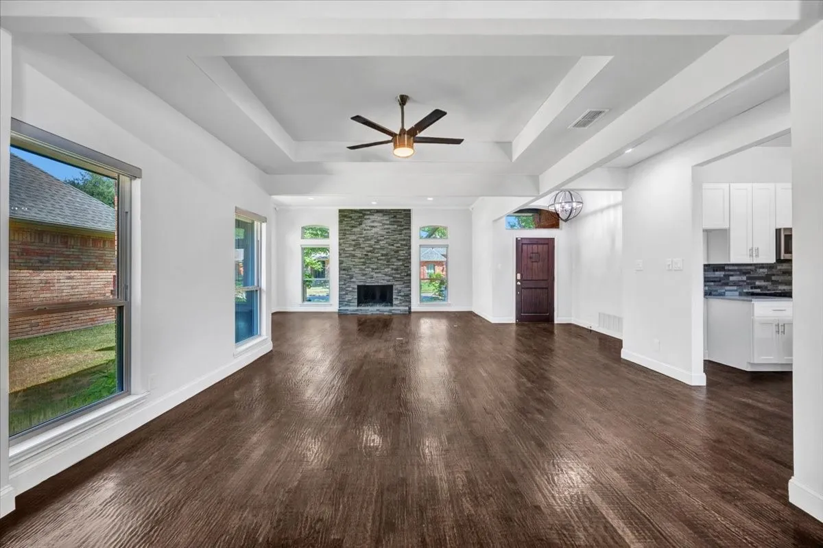 Dining room opens to eat-in kitchen as well as 2 large living areas, perfect for entertaining