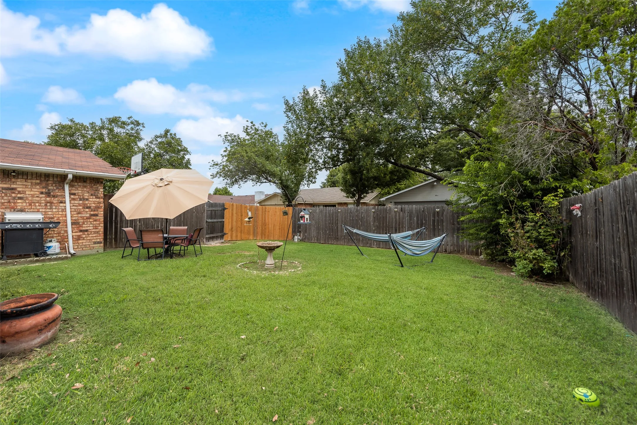 View of fenced backyard