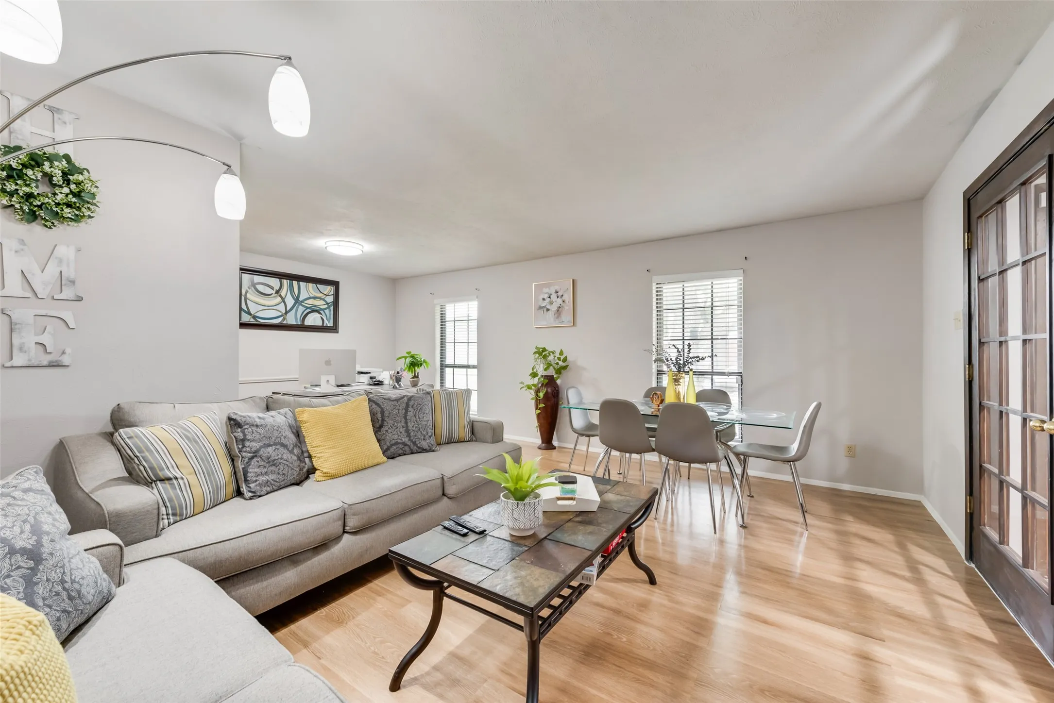 Living area featuring wood finished floors and baseboards