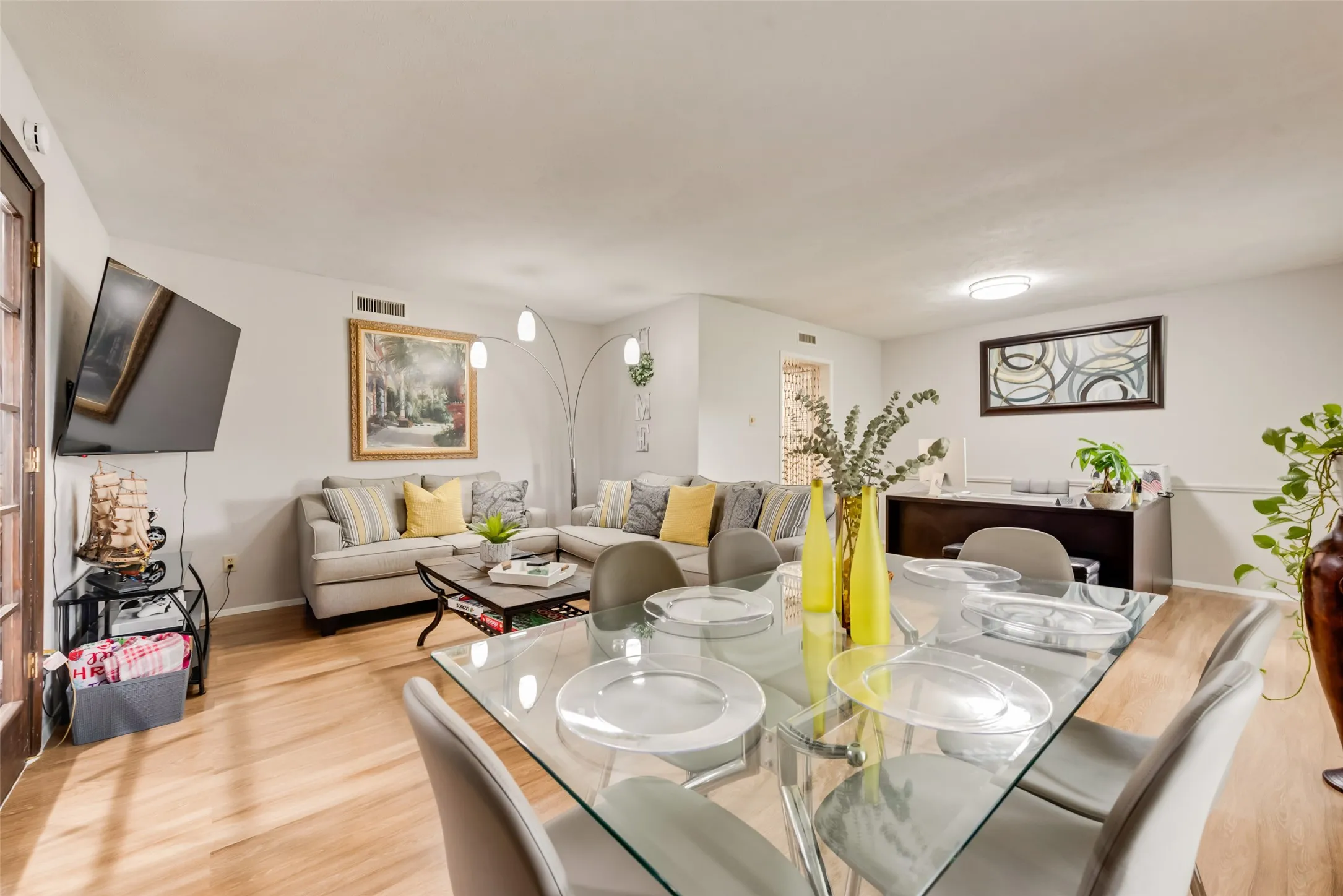 Dining space featuring wood finished floors and baseboards