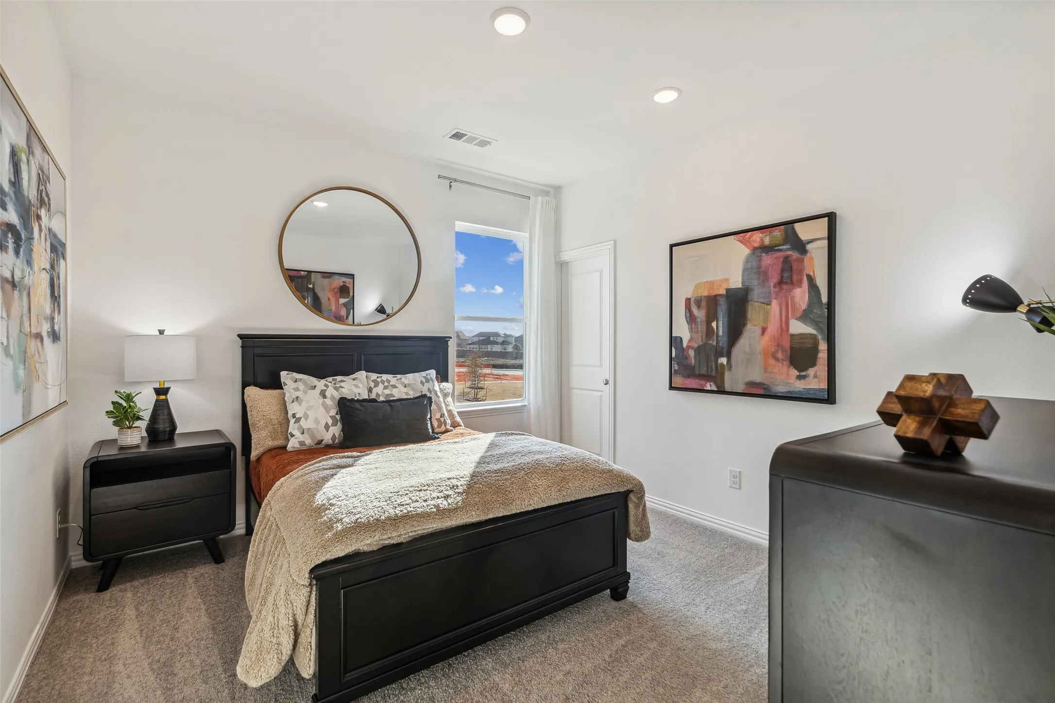 You'll find nicely sized secondary bedrooms in our Tatum plan.