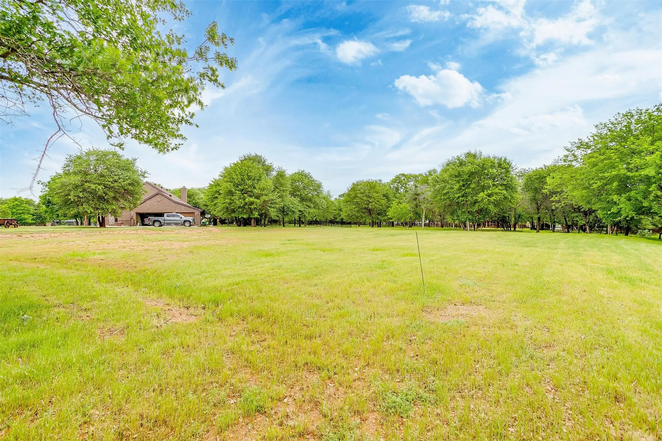 View of yard with a rural view