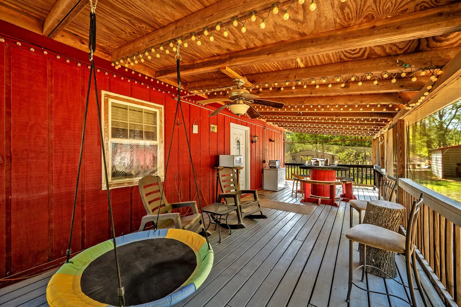 Screened in porch on the back of the house