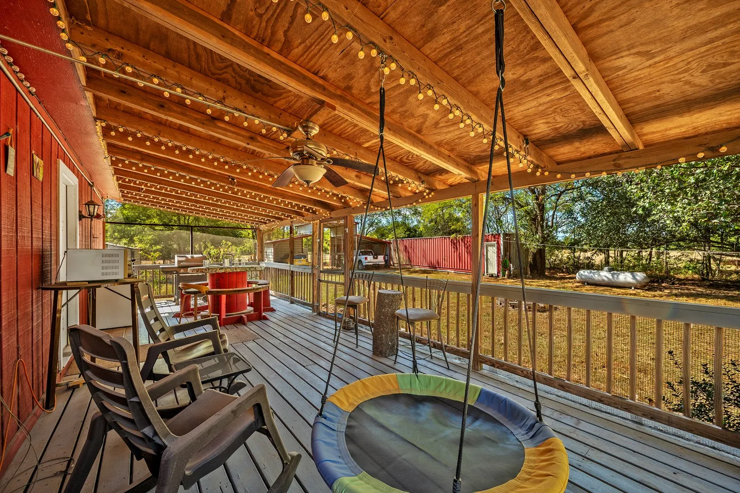 Screened in porch on the back of the house