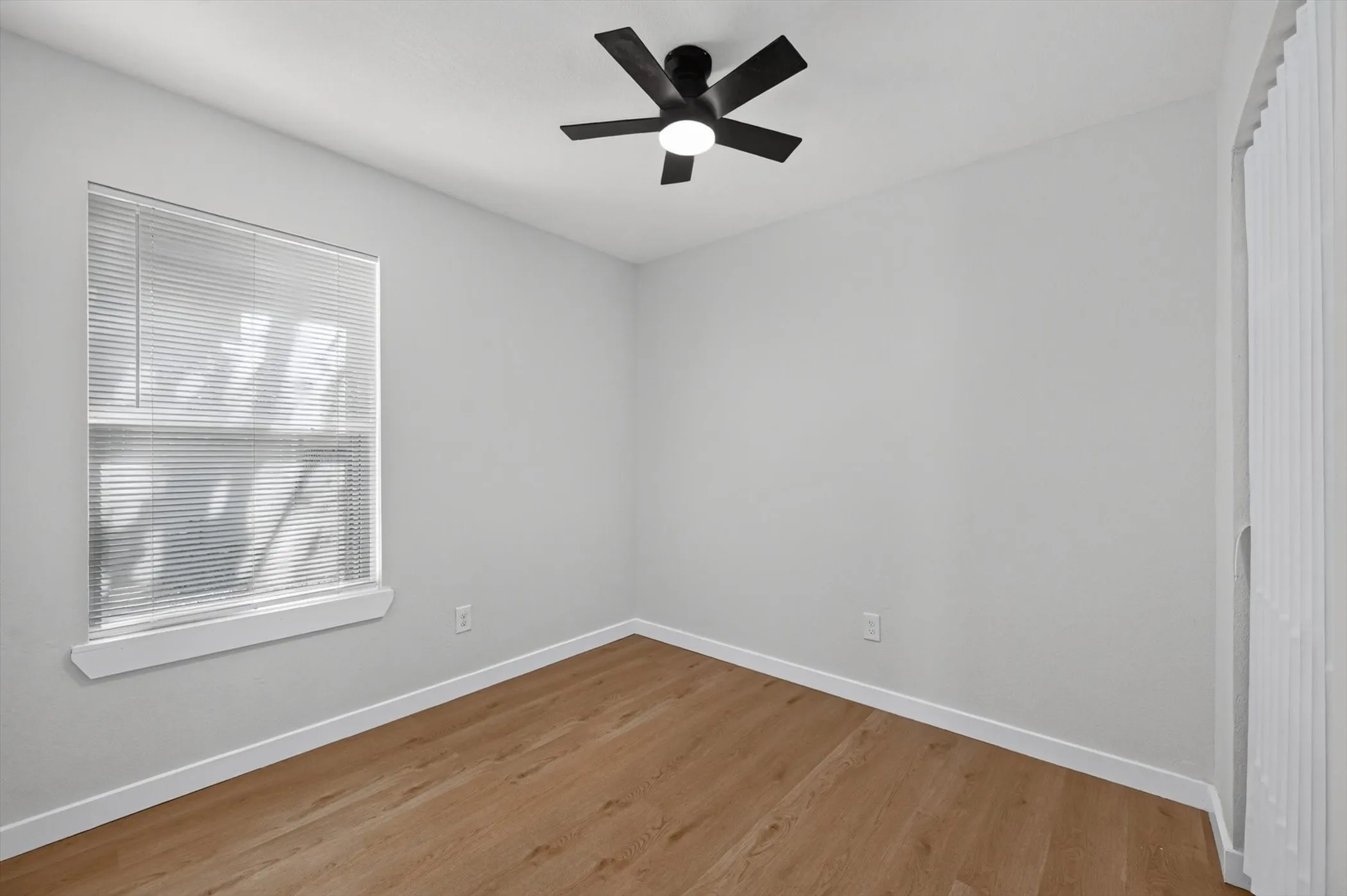 Wood-finish flooring with white trim