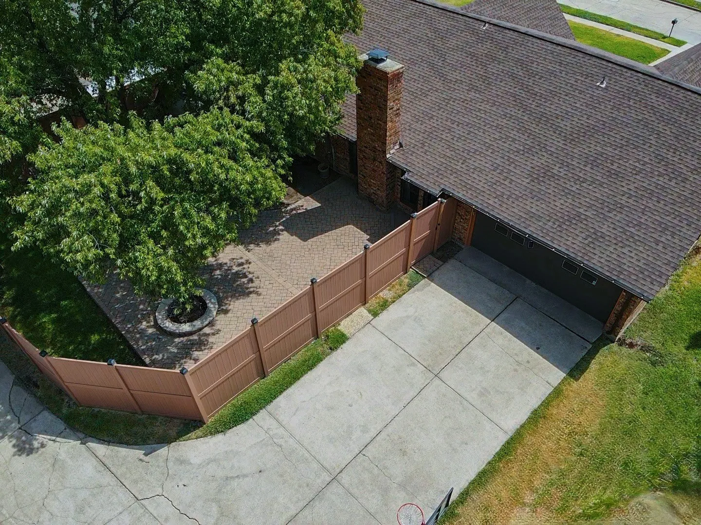 Concrete driveway providing access to a two-car garage