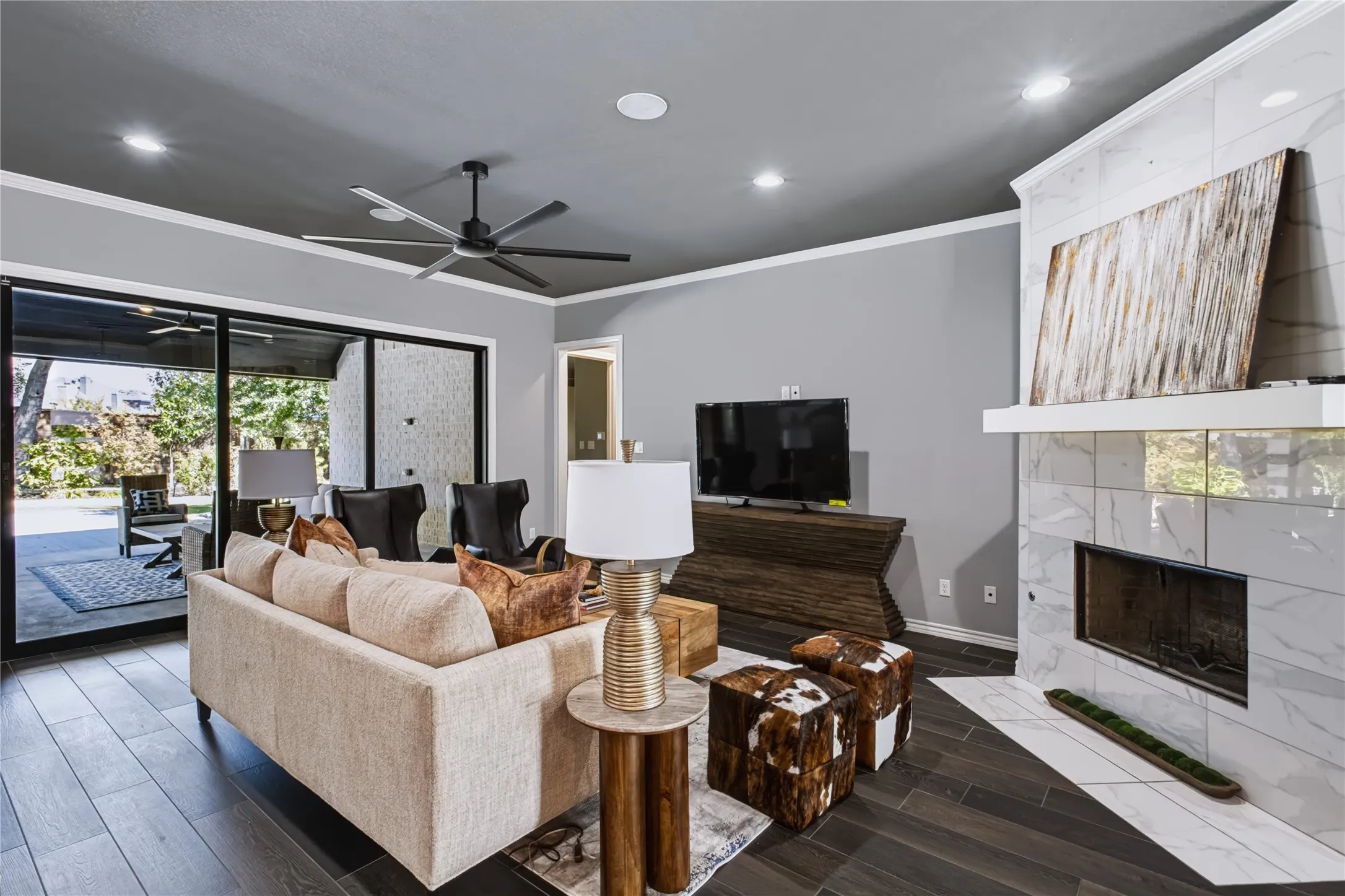 Dark wood-finish flooring with recessed lighting