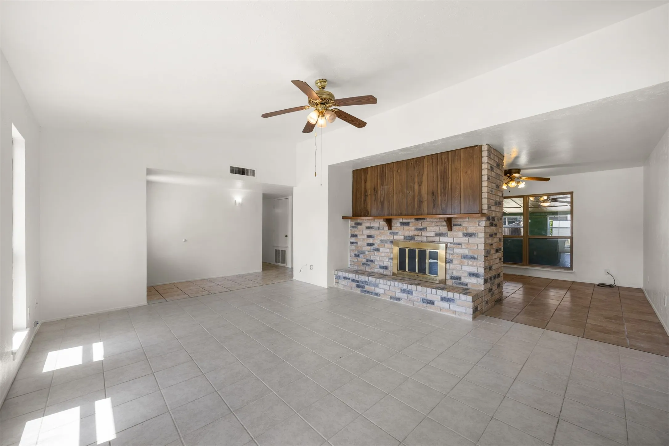 The living room flows seamlessly into the dining area, perfect for everyday living and entertaining