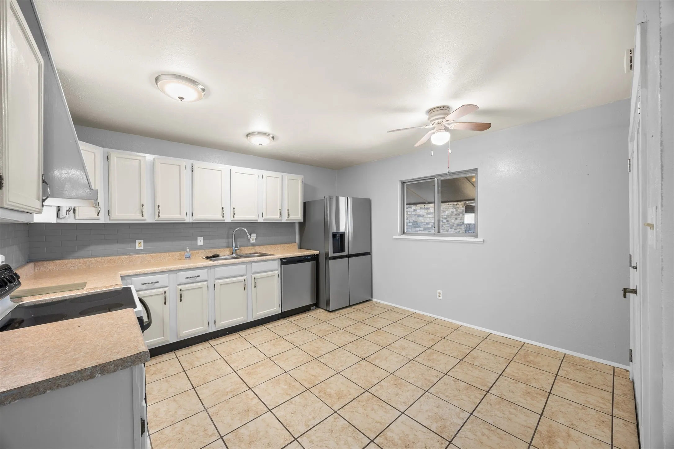 Bright, open kitchen with plenty of space for a comfortable dinette area