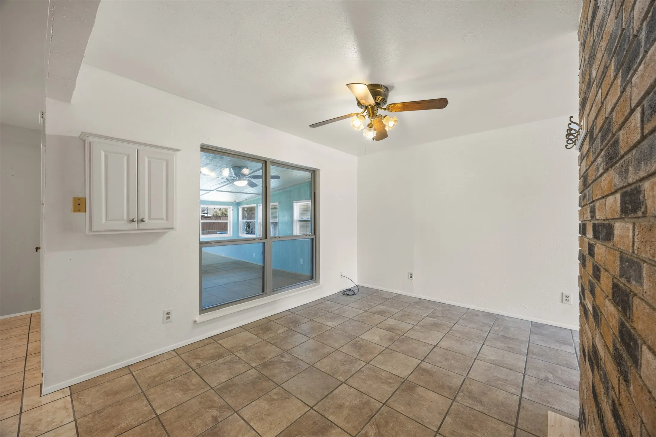 Formal dining room conveniently situated between the kitchen and living room.